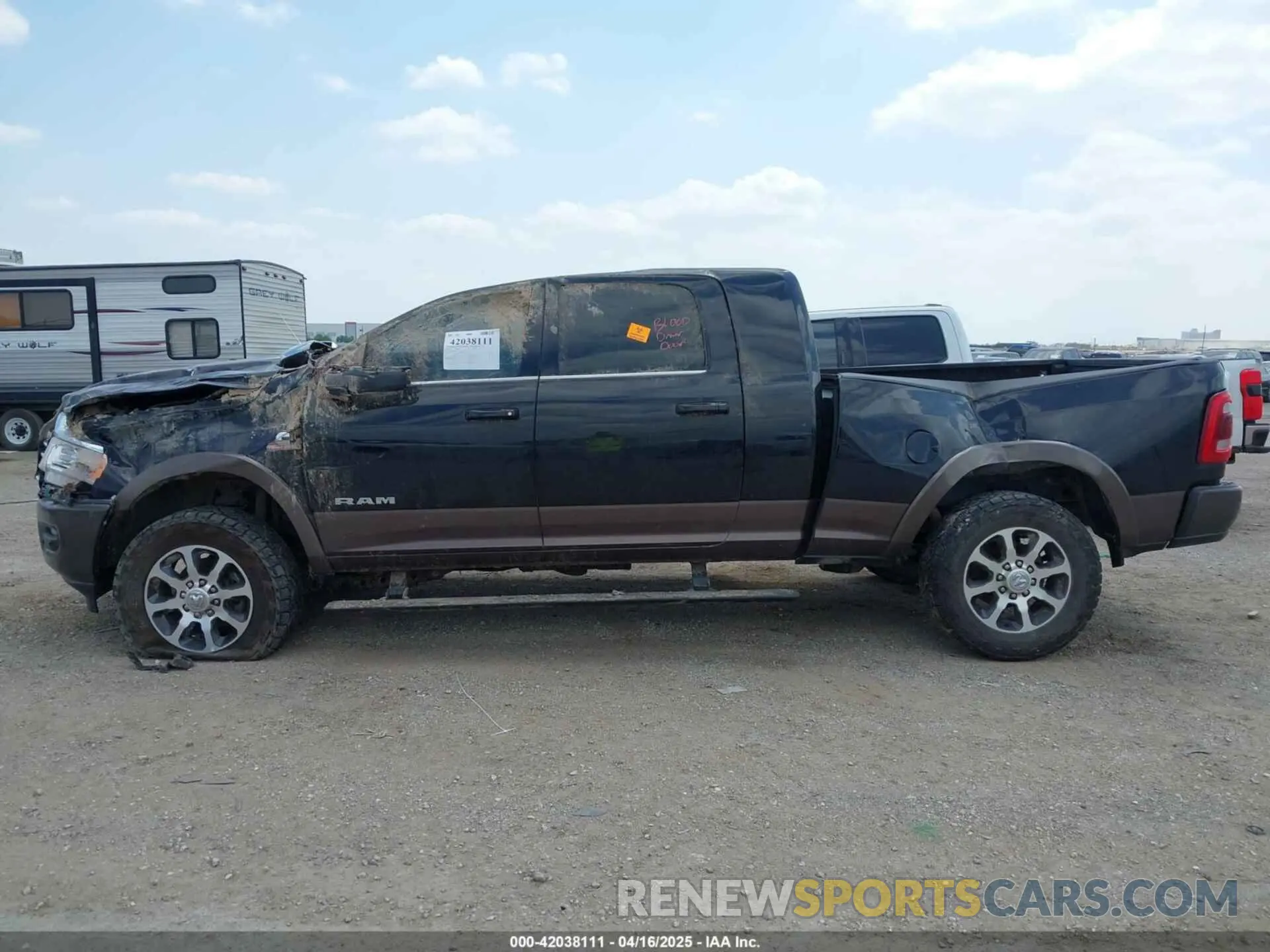 14 Photograph of a damaged car 3C6UR5PL9RG187016 RAM 2500 2024