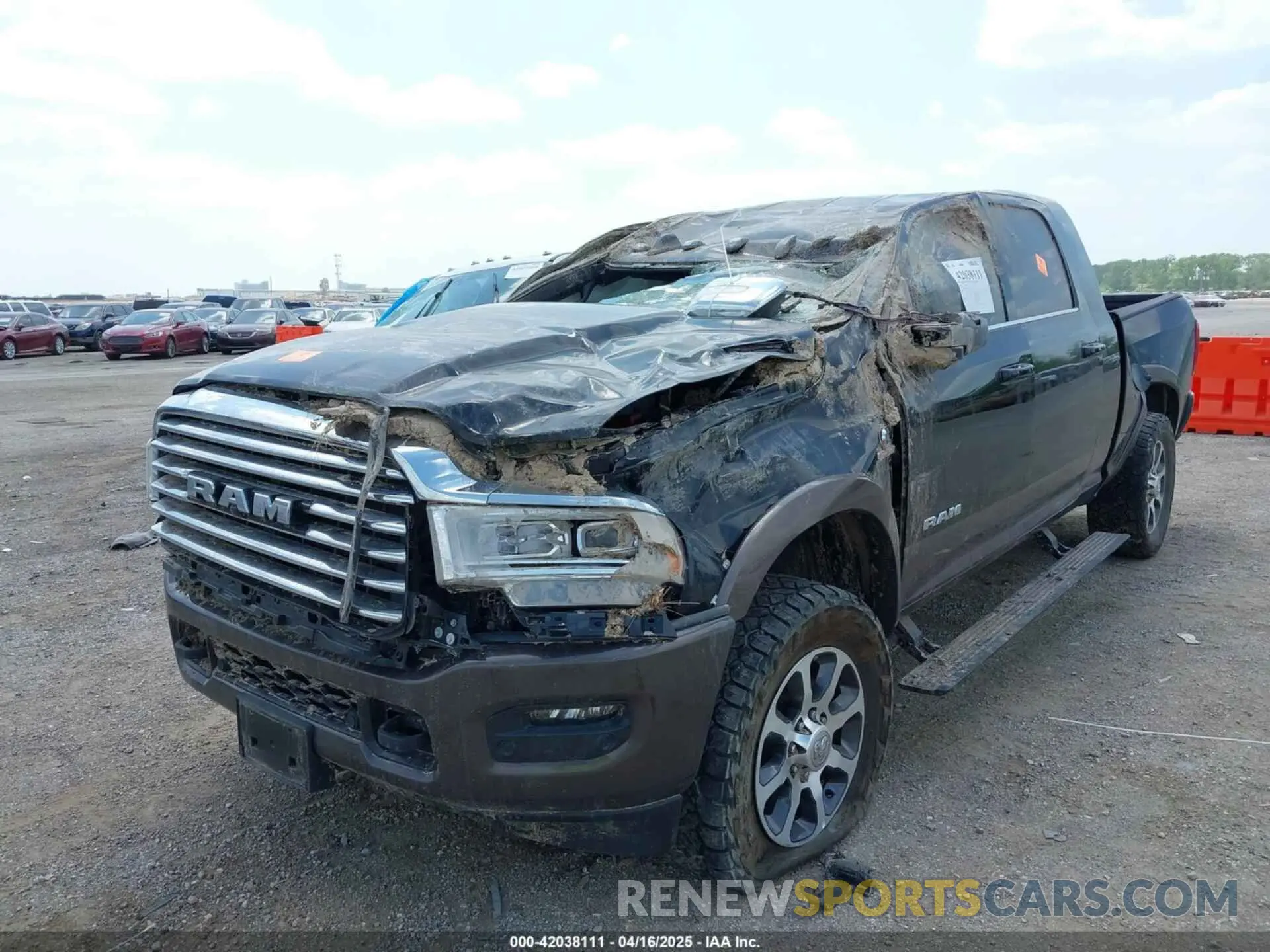 2 Photograph of a damaged car 3C6UR5PL9RG187016 RAM 2500 2024