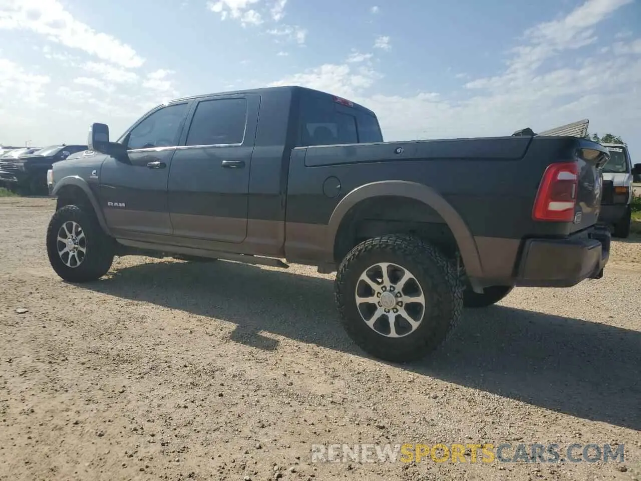 2 Photograph of a damaged car 3C6UR5PLXRG187056 RAM 2500 2024