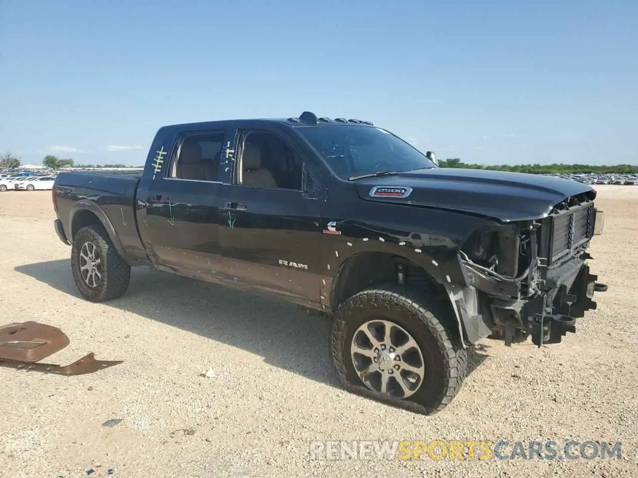 4 Photograph of a damaged car 3C6UR5PLXRG187056 RAM 2500 2024