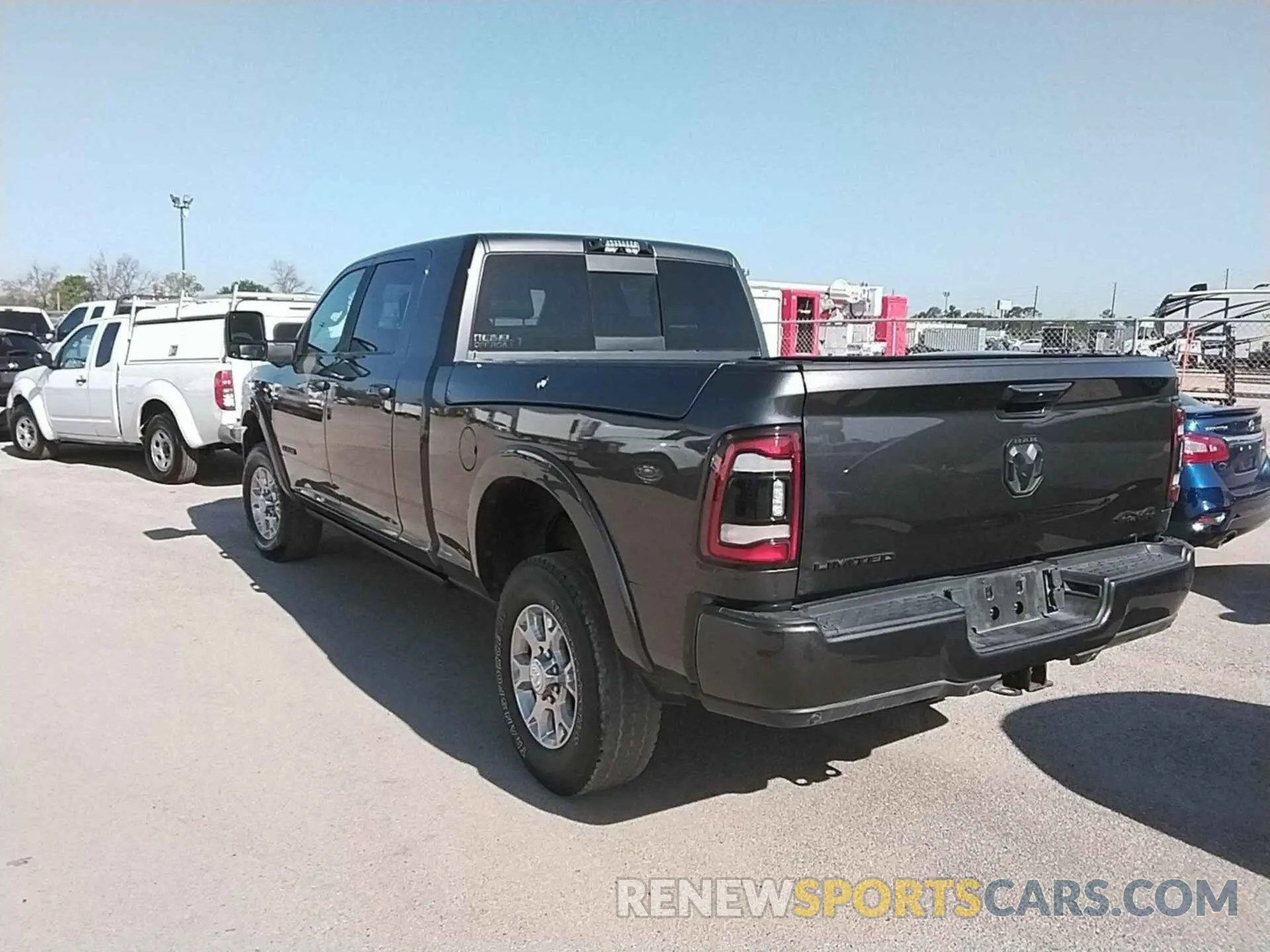 1 Photograph of a damaged car 3C6UR5TL3RG163879 RAM 2500 2024