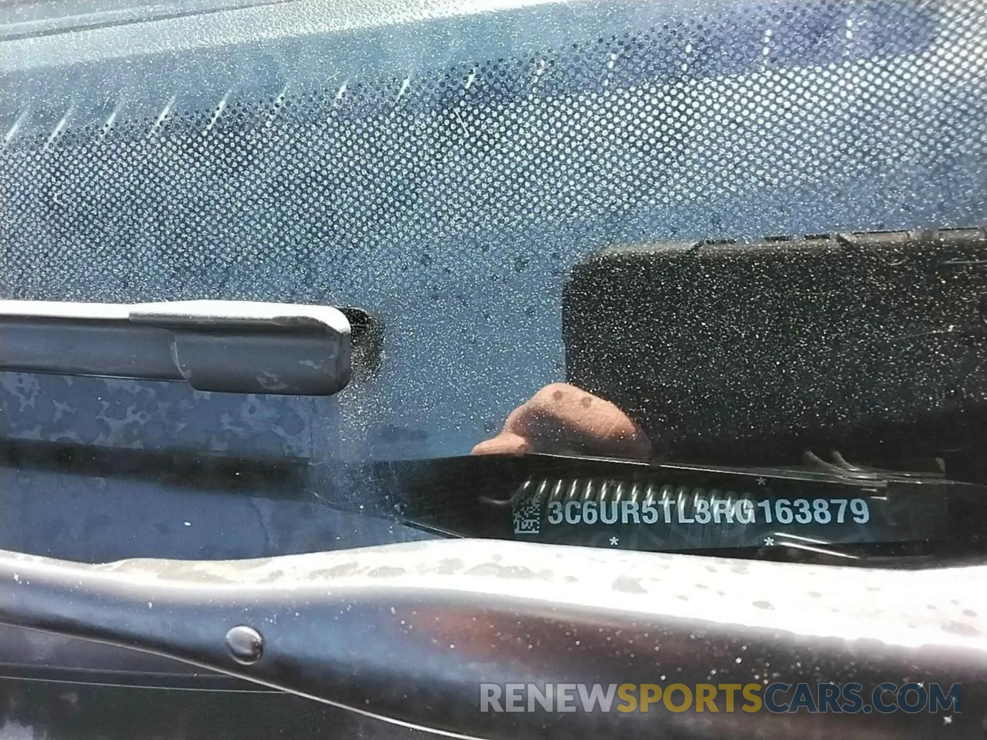 10 Photograph of a damaged car 3C6UR5TL3RG163879 RAM 2500 2024