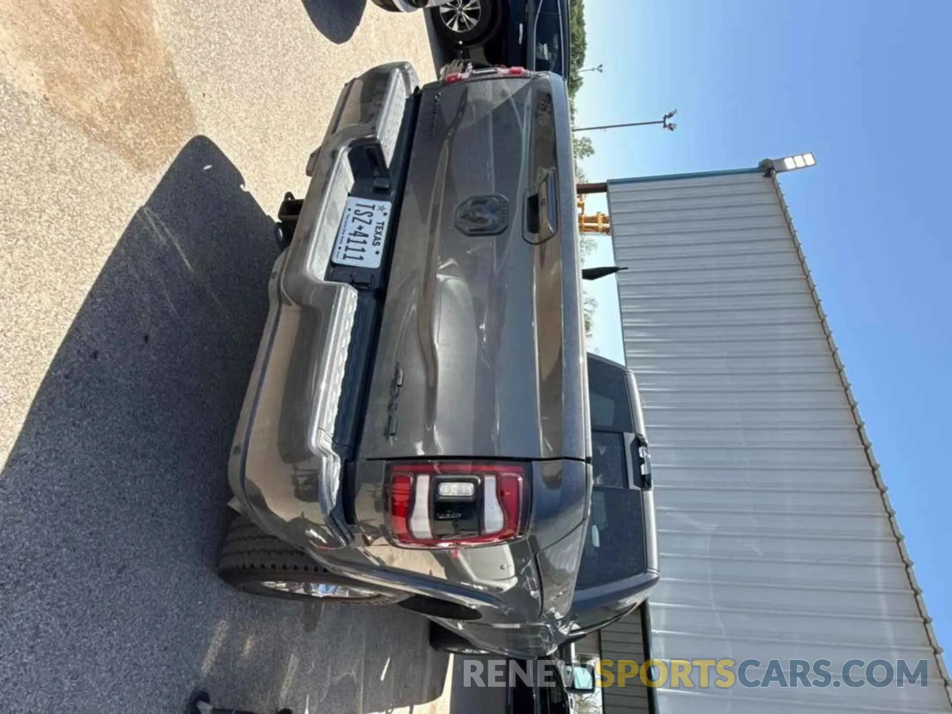 14 Photograph of a damaged car 3C6UR5TL3RG163879 RAM 2500 2024