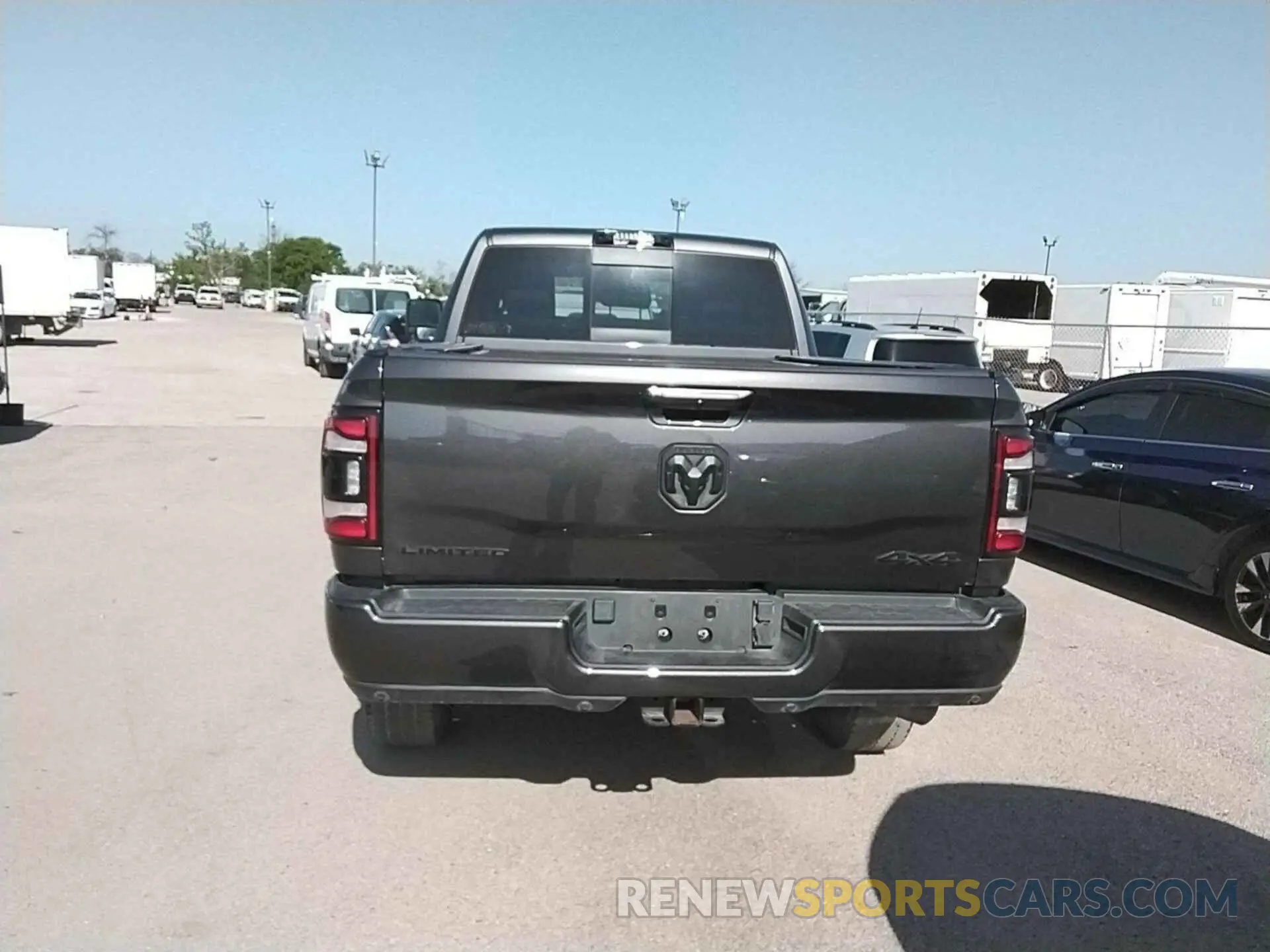 3 Photograph of a damaged car 3C6UR5TL3RG163879 RAM 2500 2024