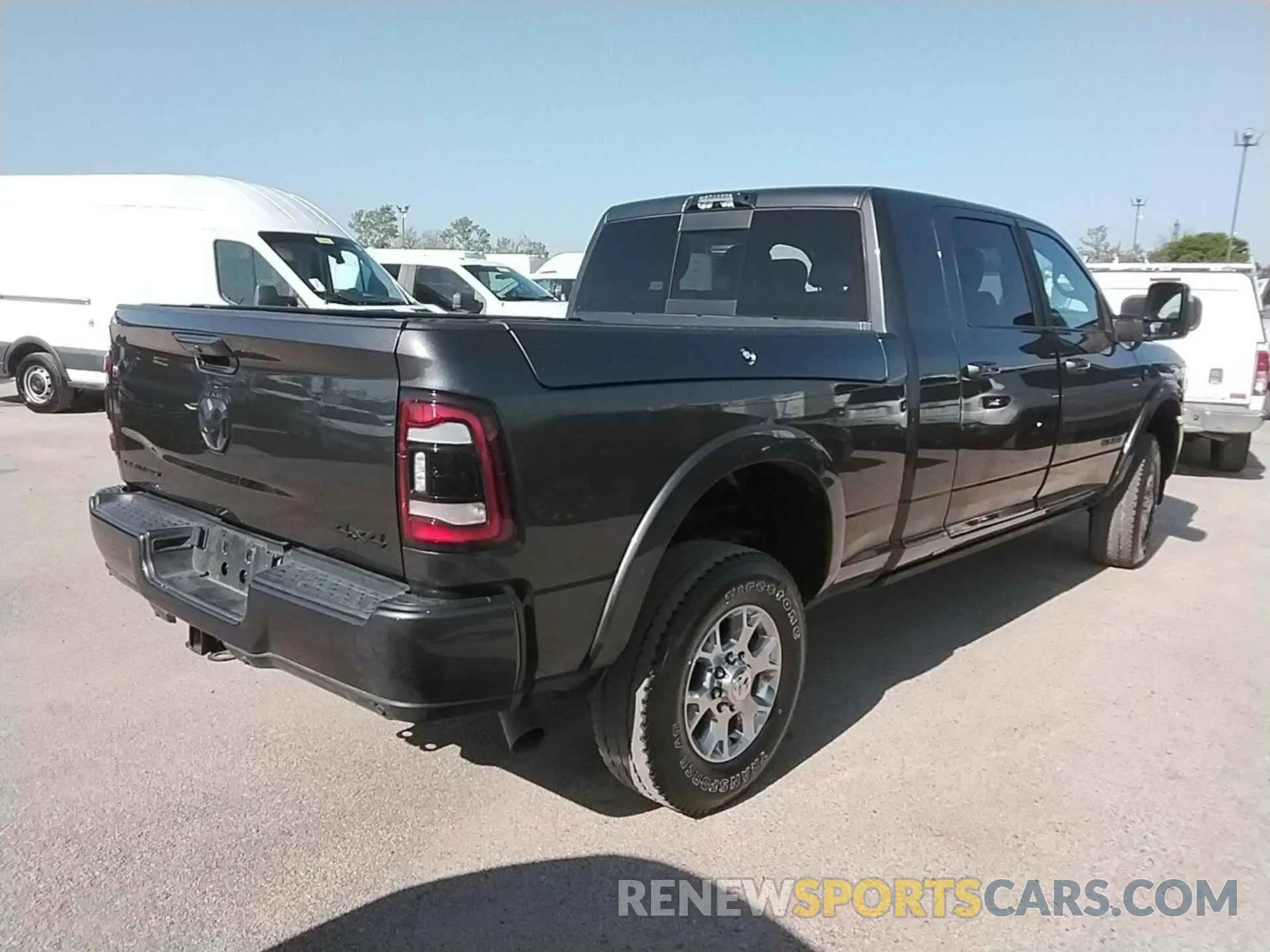 4 Photograph of a damaged car 3C6UR5TL3RG163879 RAM 2500 2024