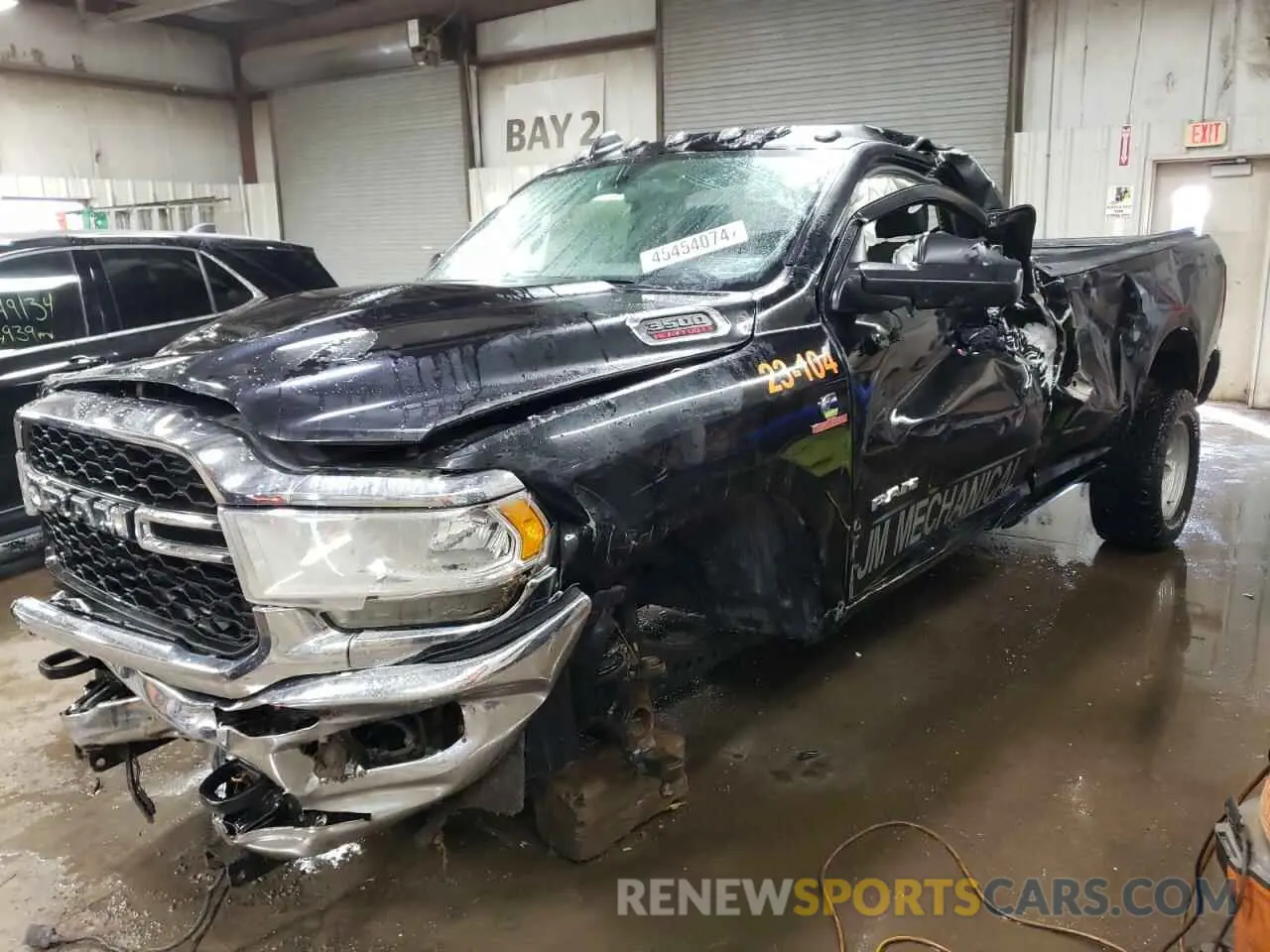 1 Photograph of a damaged car 3C63R3AL4KG673229 RAM 3500 2019