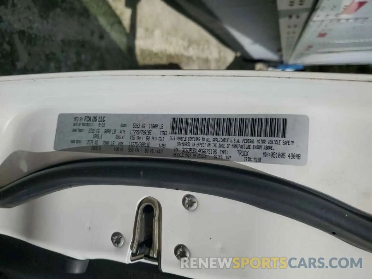 12 Photograph of a damaged car 3C63R3DL4KG675106 RAM 3500 2019