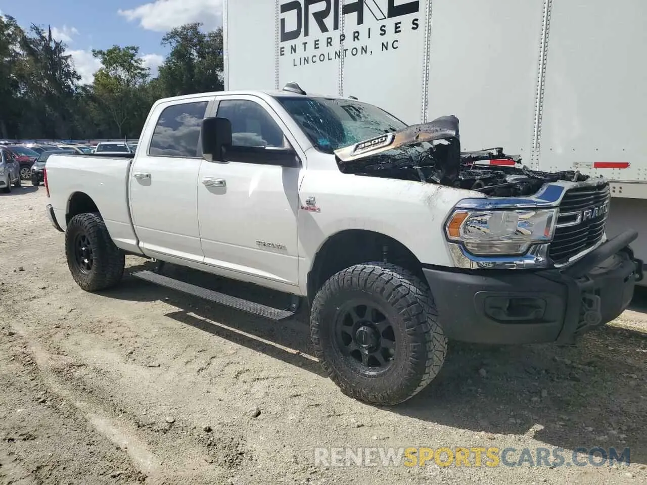 4 Photograph of a damaged car 3C63R3DL4KG675106 RAM 3500 2019