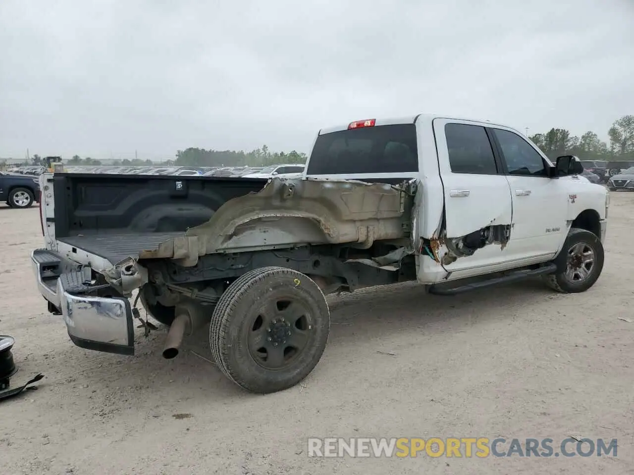 3 Photograph of a damaged car 3C63R3HJ1KG604809 RAM 3500 2019