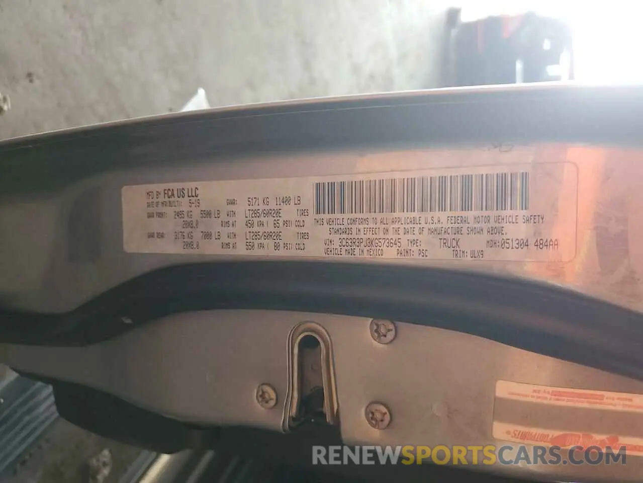 12 Photograph of a damaged car 3C63R3PJ3KG573645 RAM 3500 2019