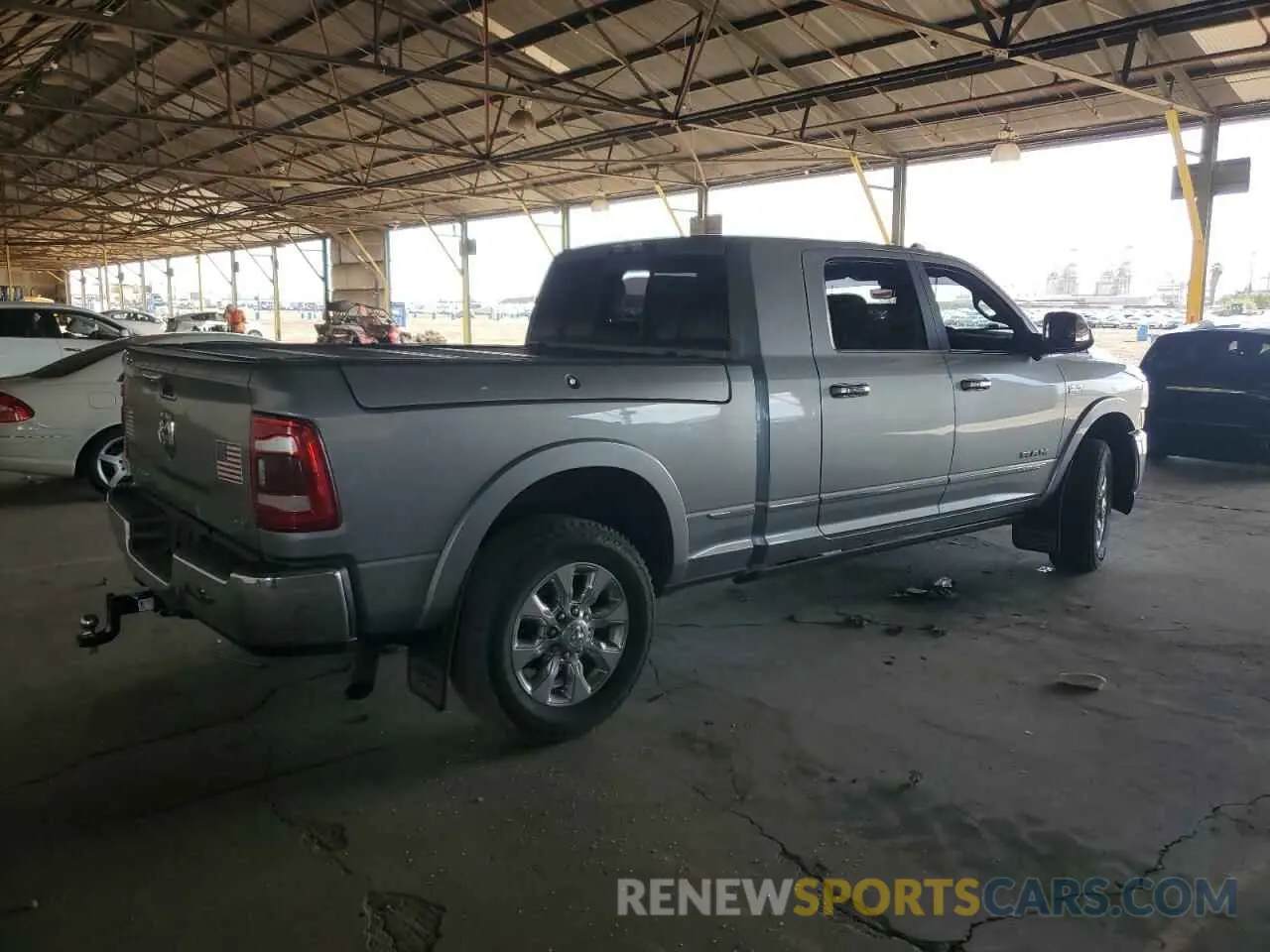 3 Photograph of a damaged car 3C63R3PJ3KG573645 RAM 3500 2019