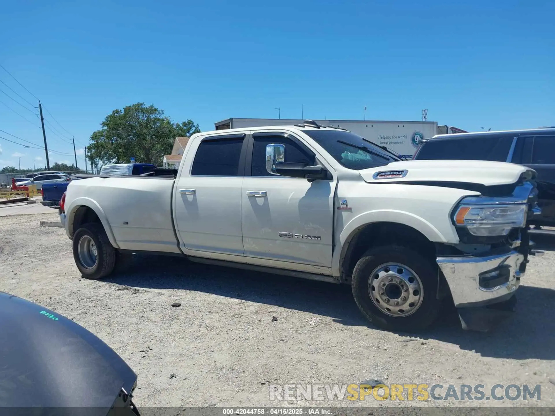 13 Photograph of a damaged car 3C63RPKL7KG560333 RAM 3500 2019