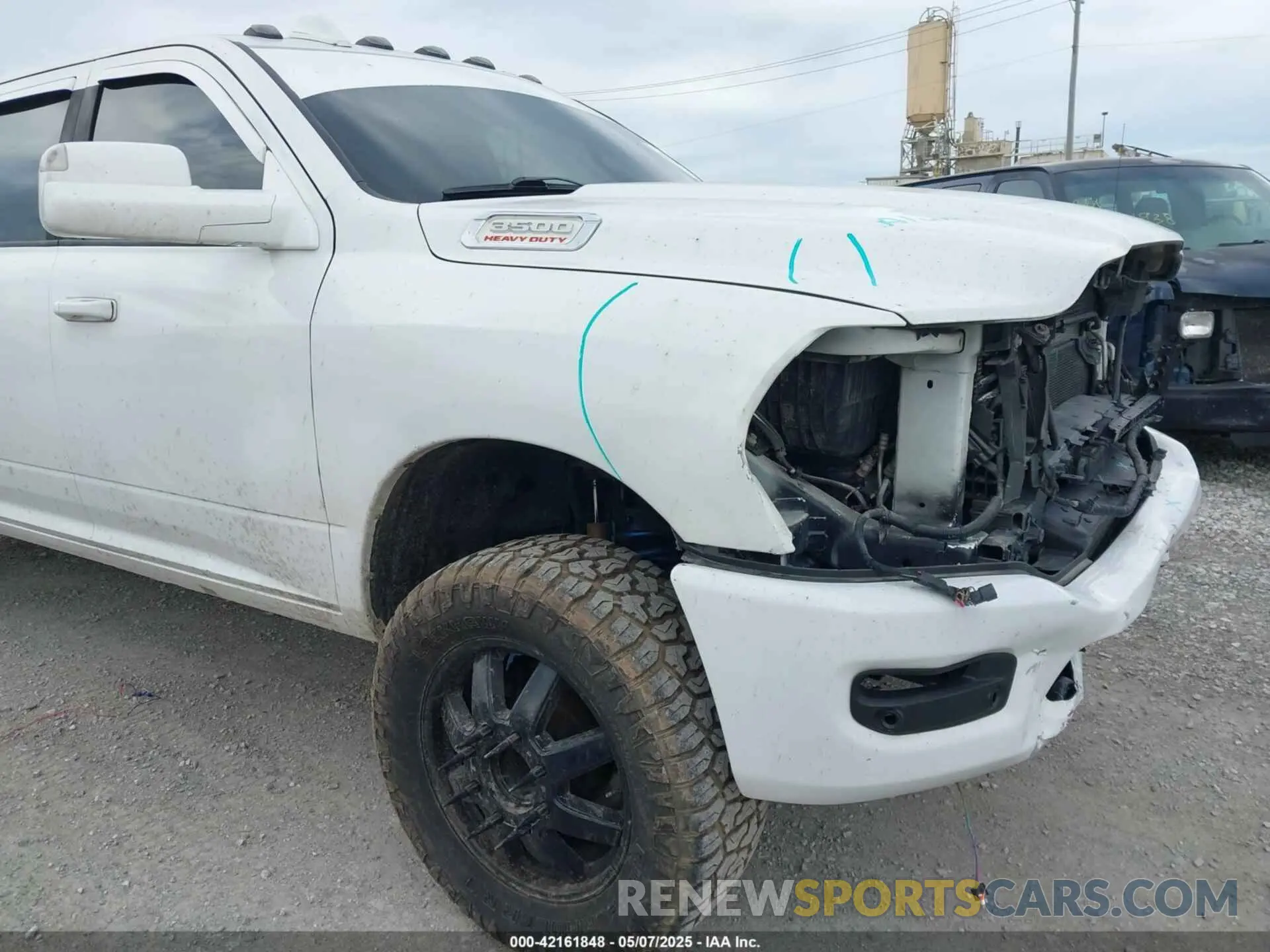 13 Photograph of a damaged car 3C63RRGL4KG557958 RAM 3500 2019