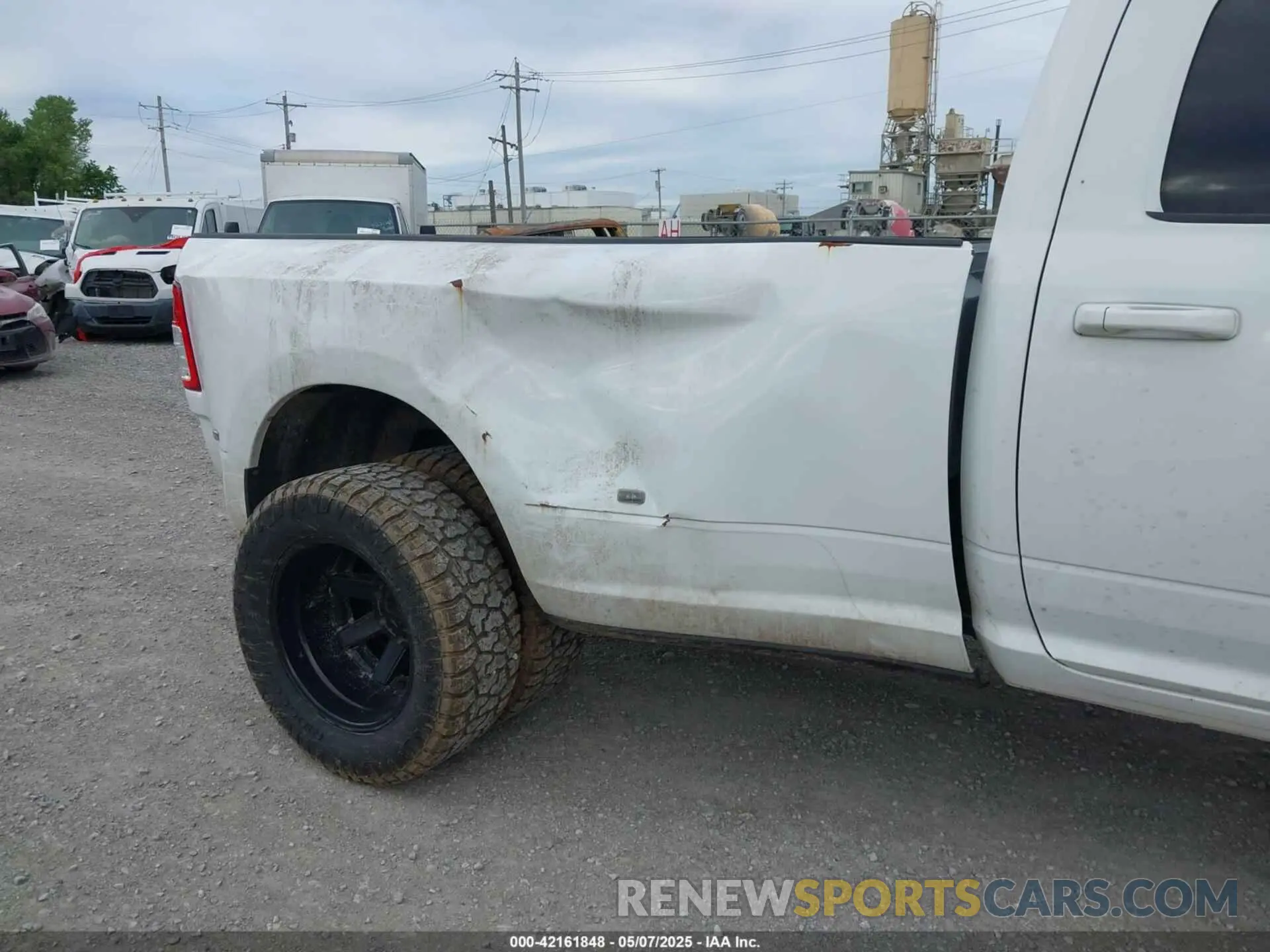 14 Photograph of a damaged car 3C63RRGL4KG557958 RAM 3500 2019