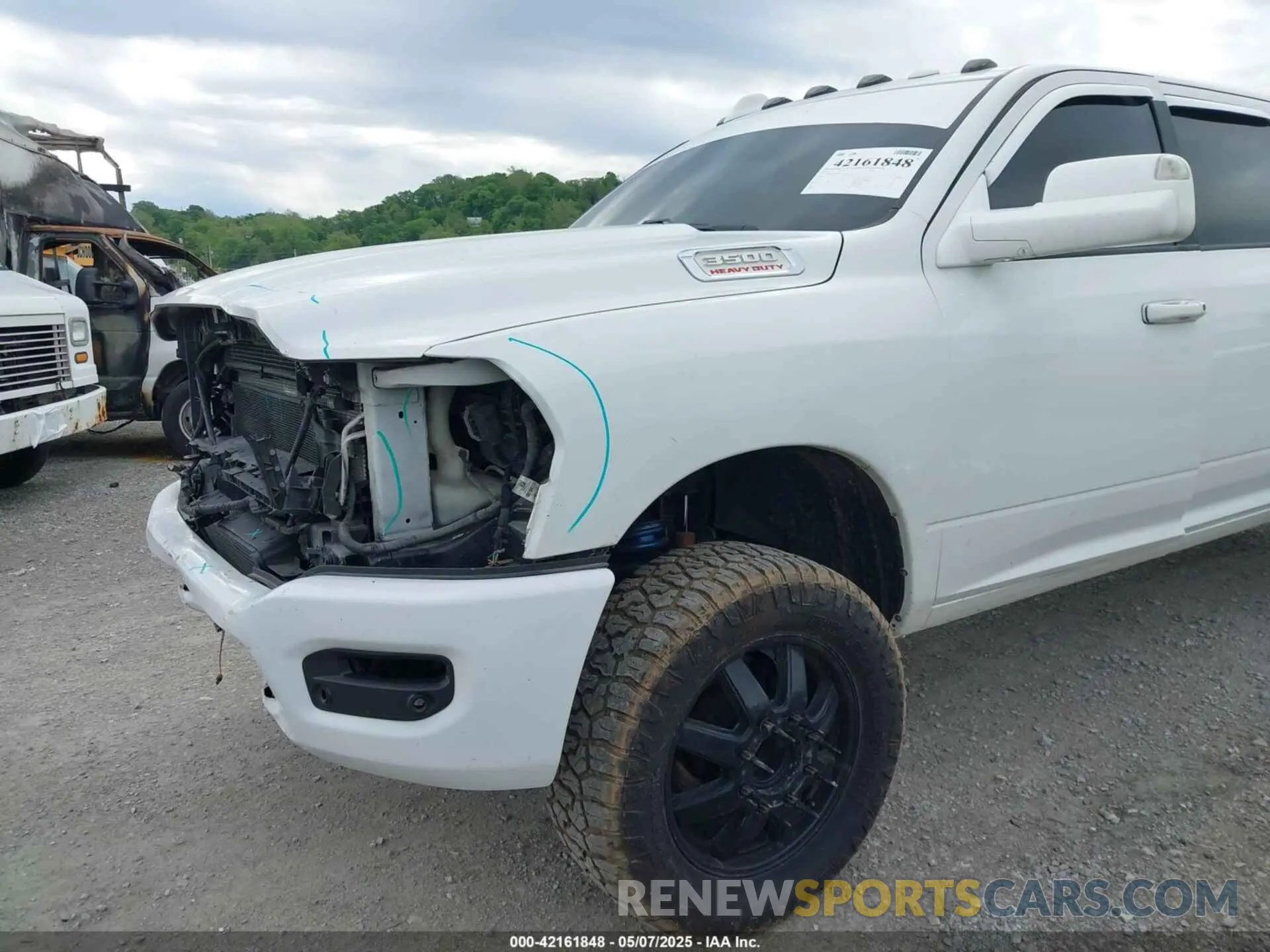 21 Photograph of a damaged car 3C63RRGL4KG557958 RAM 3500 2019