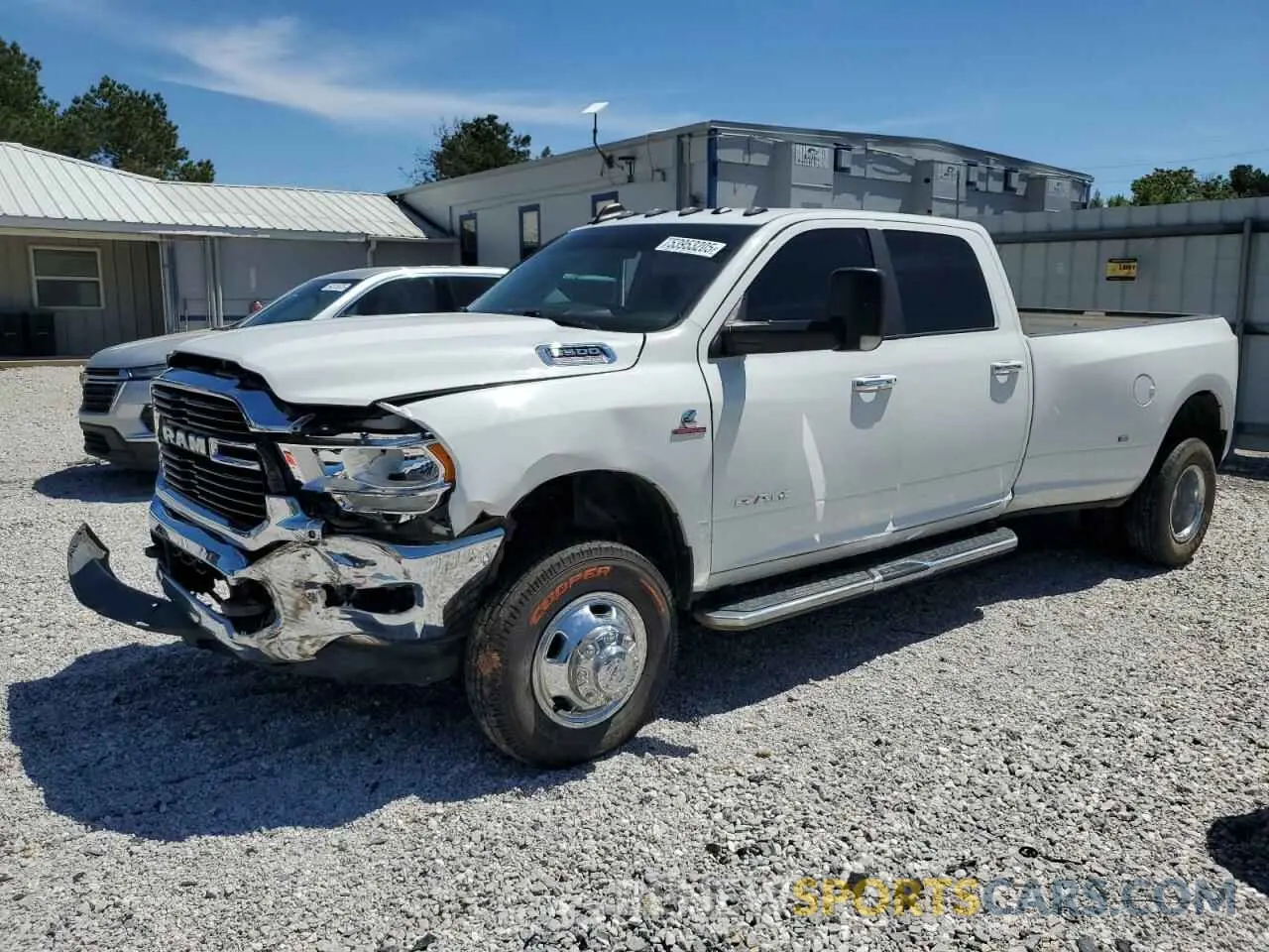 1 Photograph of a damaged car 3C63RRHL1KG724324 RAM 3500 2019