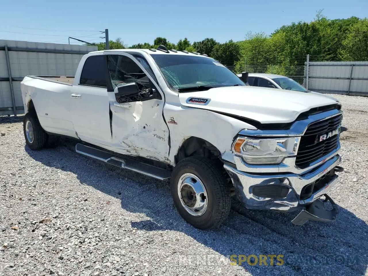 4 Photograph of a damaged car 3C63RRHL1KG724324 RAM 3500 2019