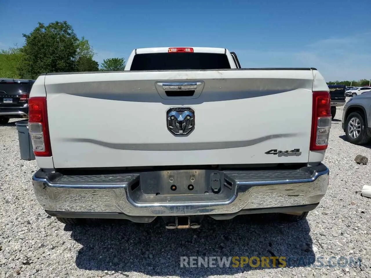 6 Photograph of a damaged car 3C63RRHL1KG724324 RAM 3500 2019