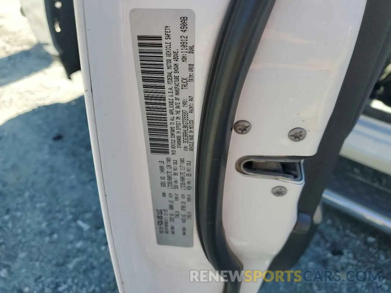 12 Photograph of a damaged car 3C63RRHL8KG725597 RAM 3500 2019