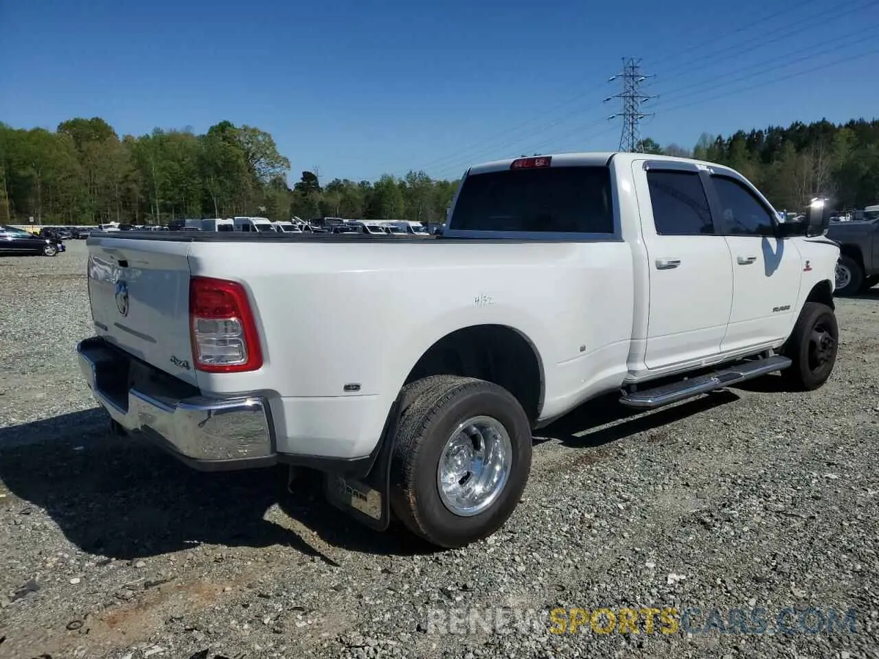 3 Photograph of a damaged car 3C63RRHL8KG725597 RAM 3500 2019