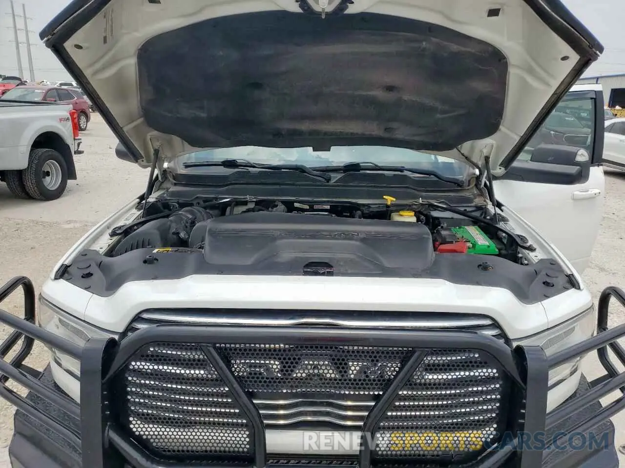 11 Photograph of a damaged car 3C63RRJL5KG524928 RAM 3500 2019