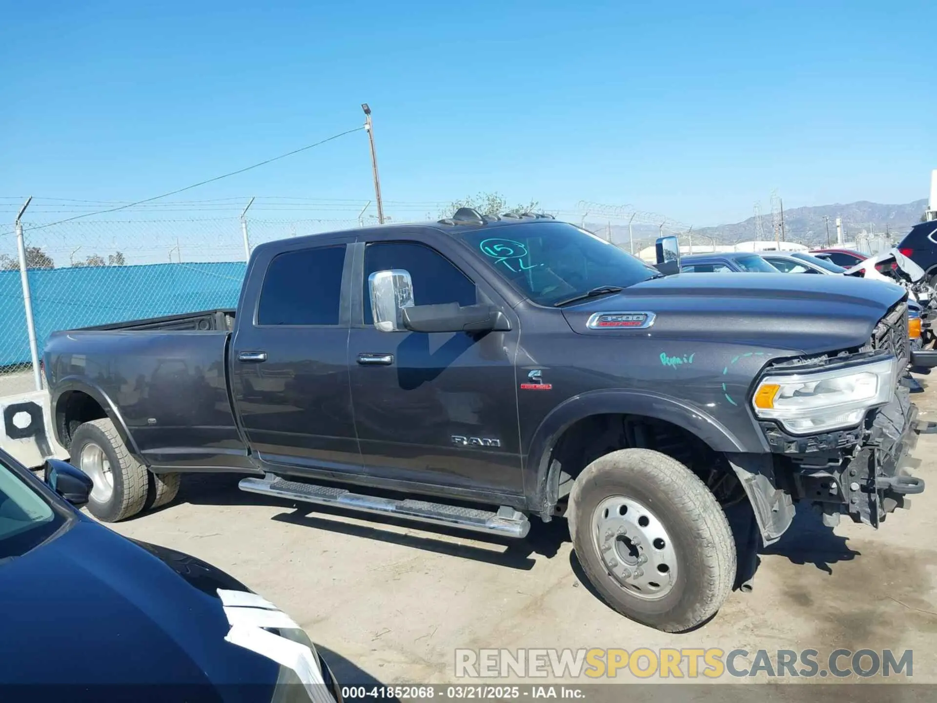14 Photograph of a damaged car 3C63RRJL7KG537146 RAM 3500 2019