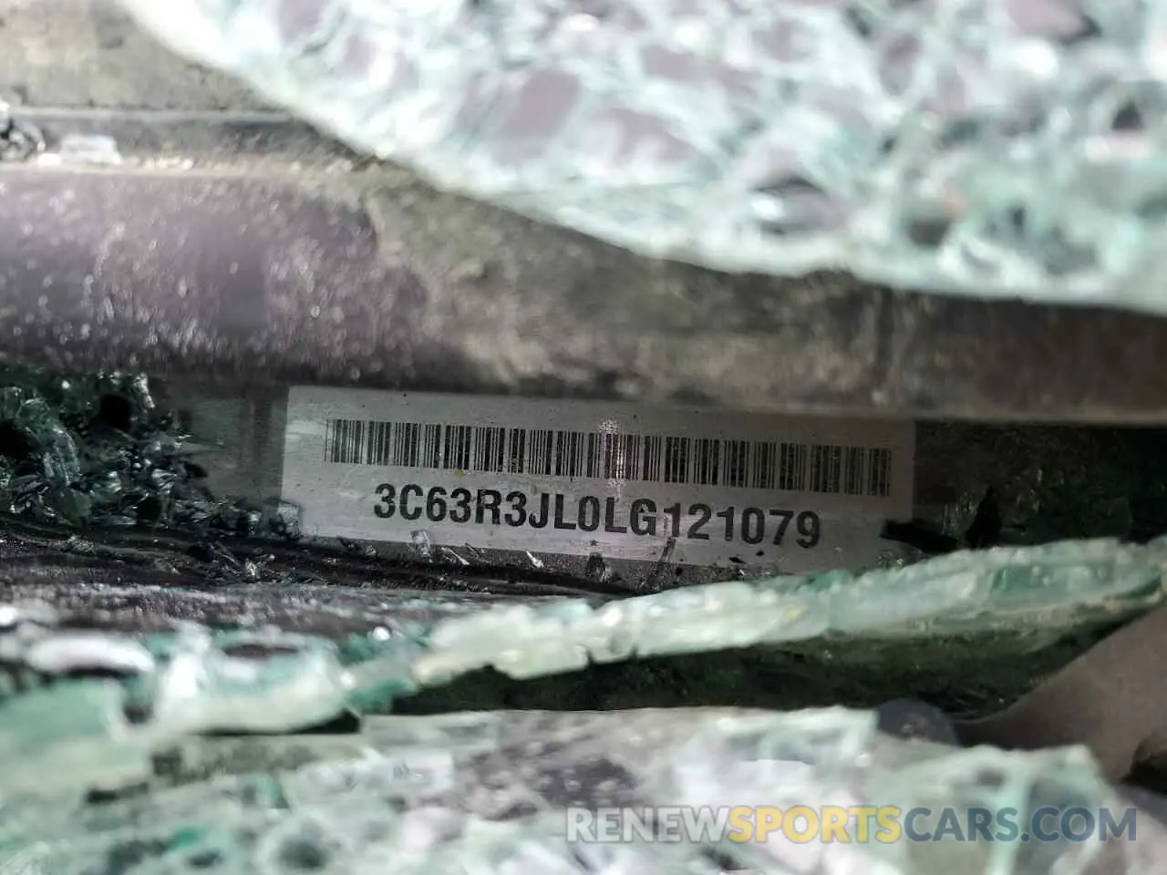 14 Photograph of a damaged car 3C63R3JL0LG121079 RAM 3500 2020
