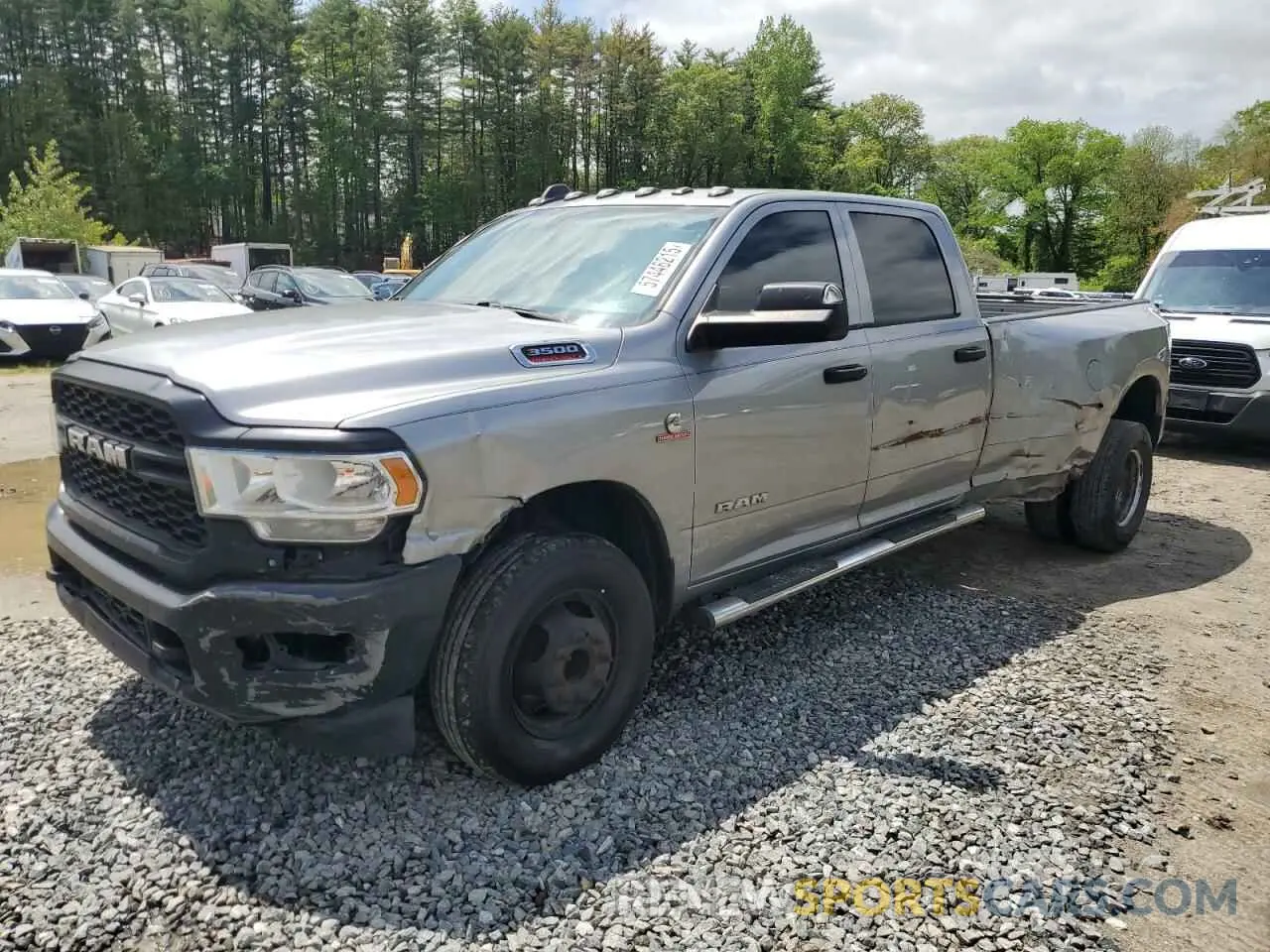 1 Photograph of a damaged car 3C63RPGL5LG113462 RAM 3500 2020