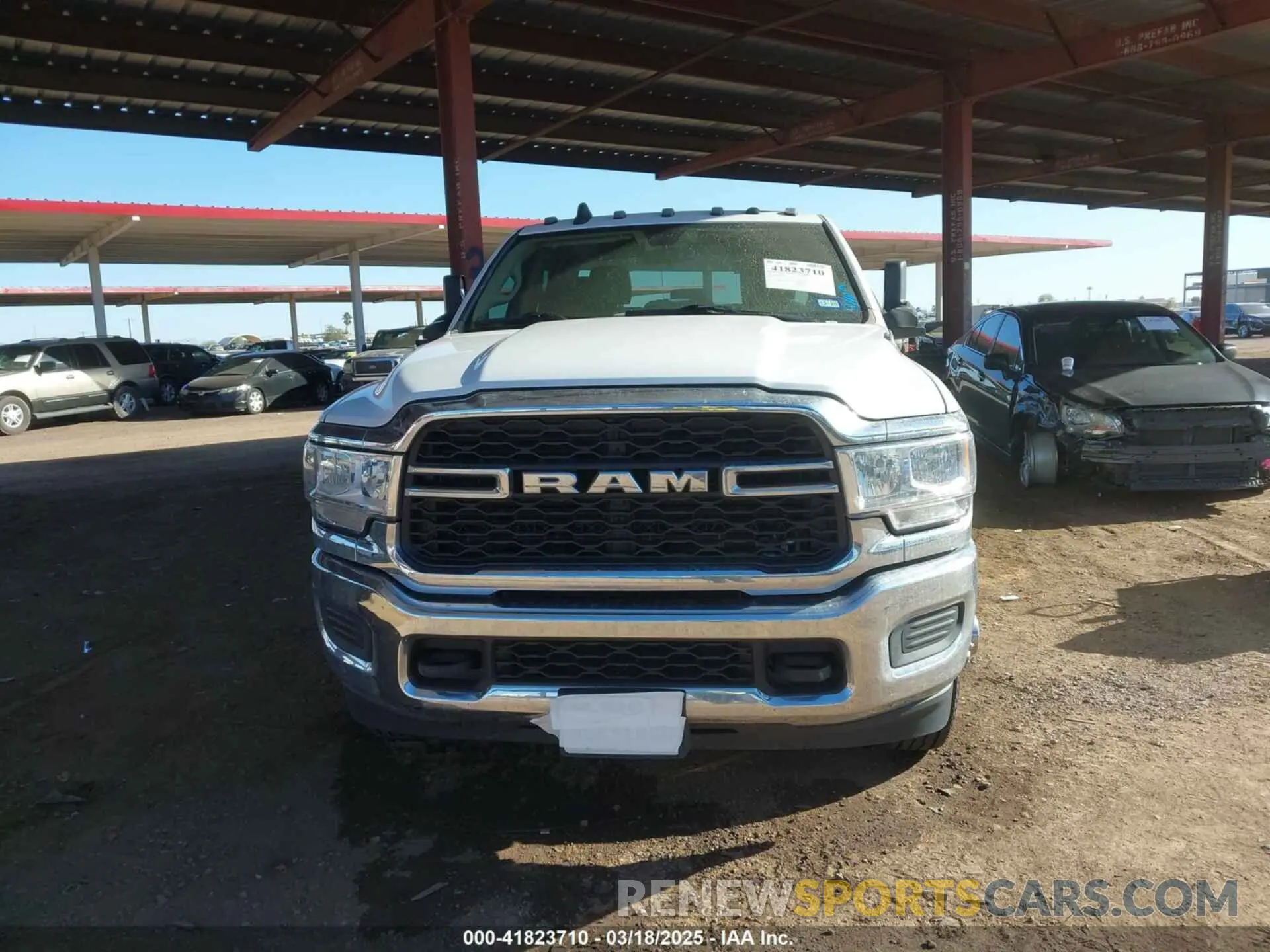 12 Photograph of a damaged car 3C63RRGL3LG233899 RAM 3500 2020