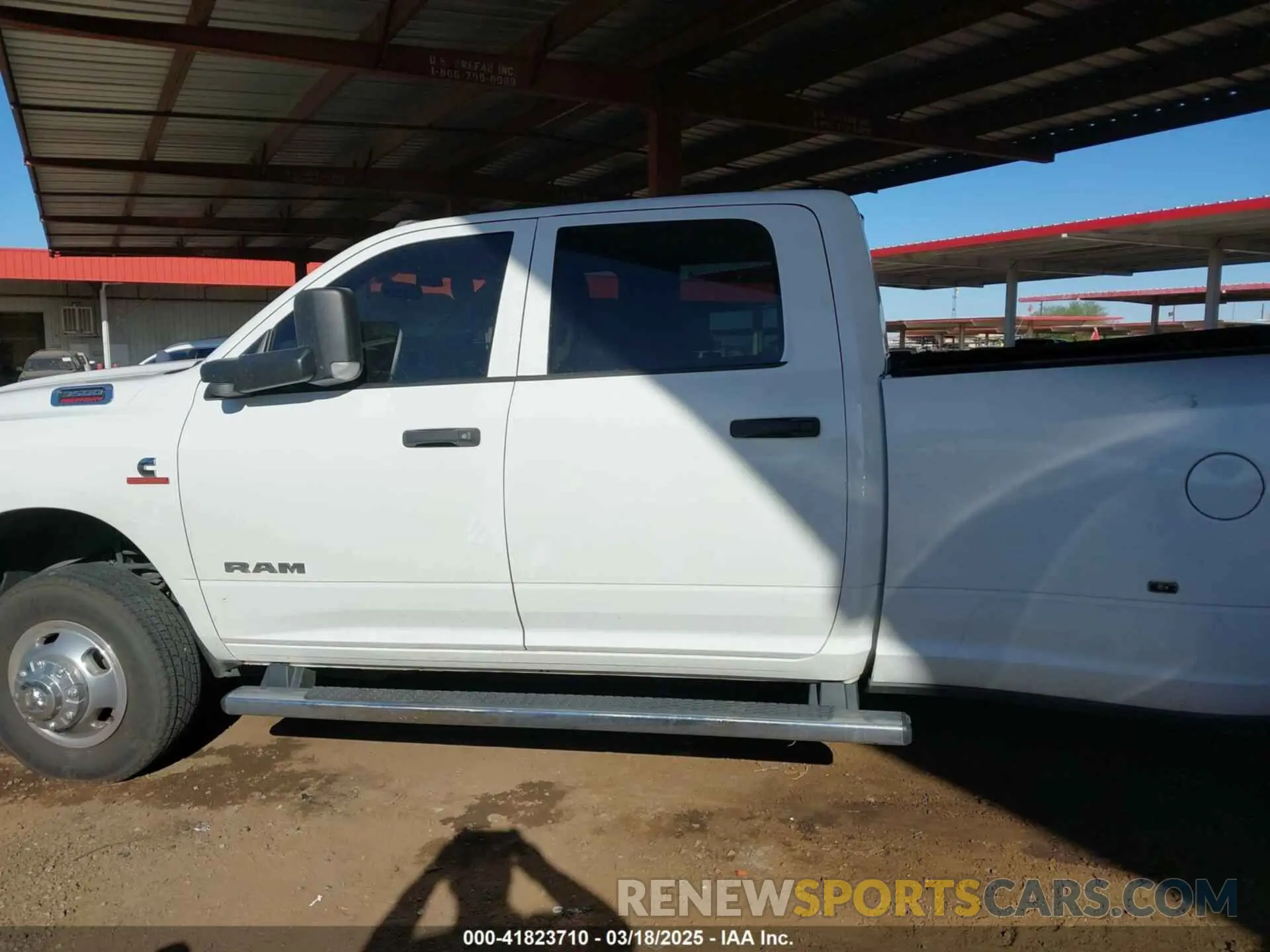 14 Photograph of a damaged car 3C63RRGL3LG233899 RAM 3500 2020