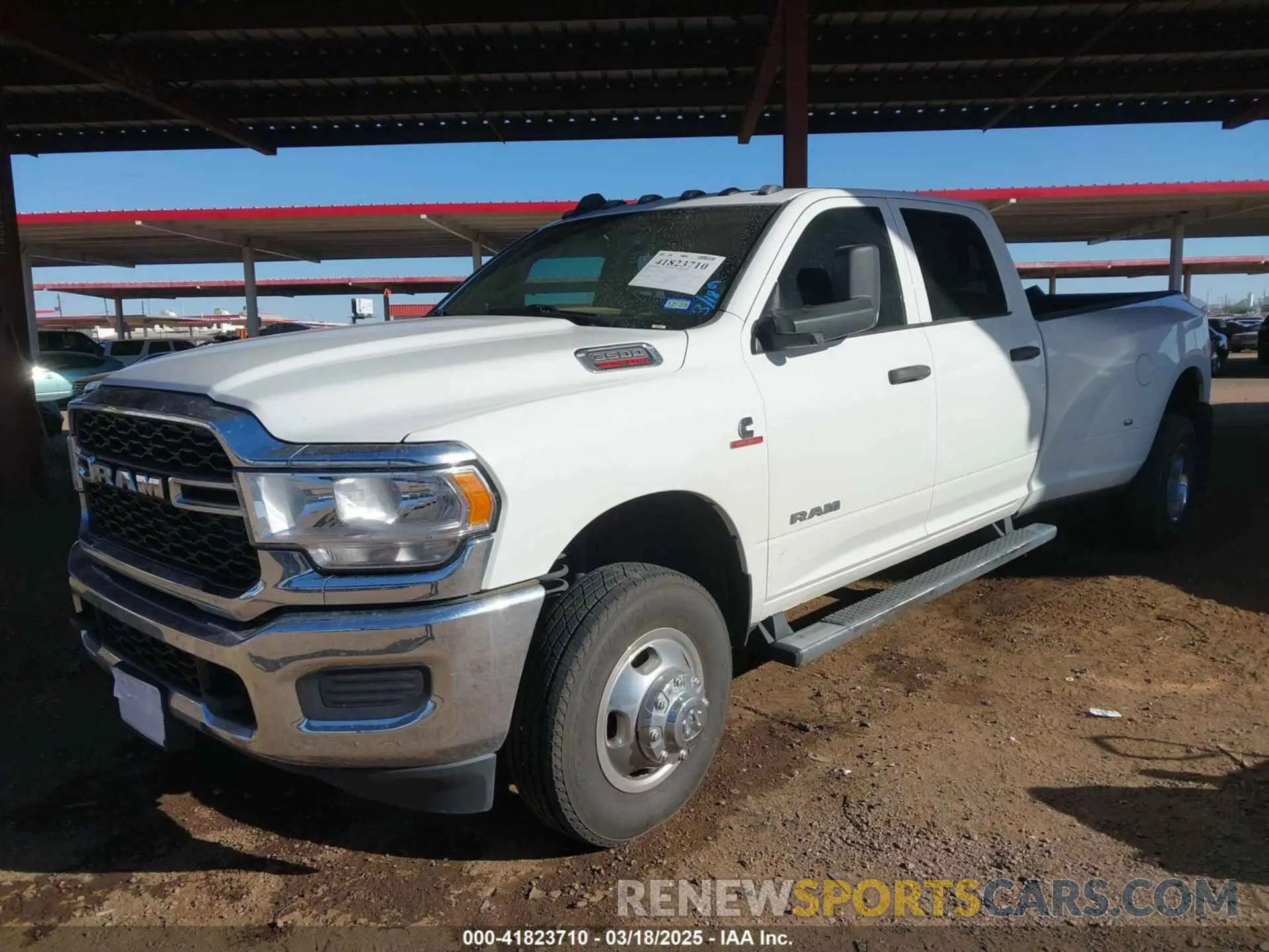 2 Photograph of a damaged car 3C63RRGL3LG233899 RAM 3500 2020