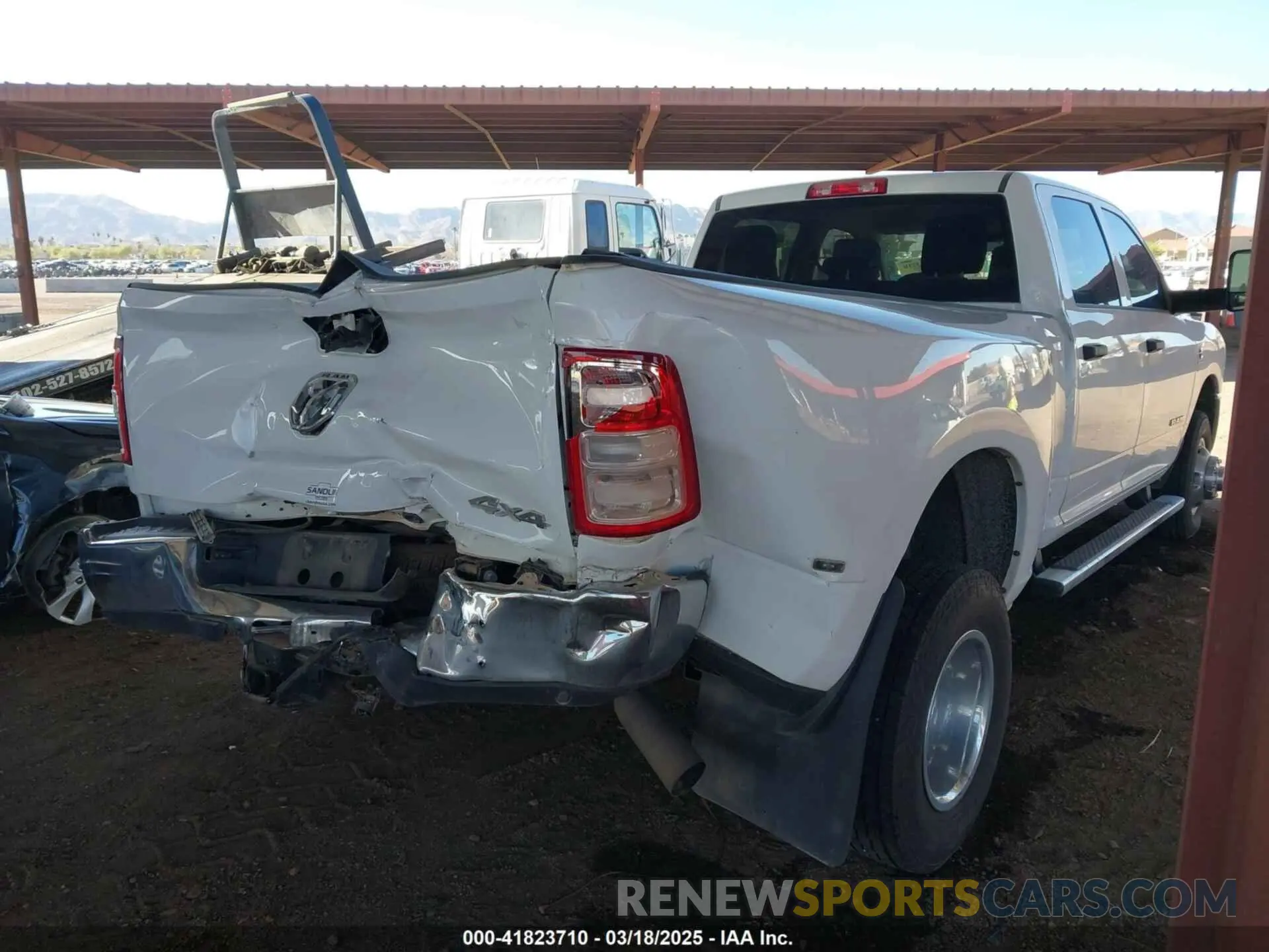 4 Photograph of a damaged car 3C63RRGL3LG233899 RAM 3500 2020