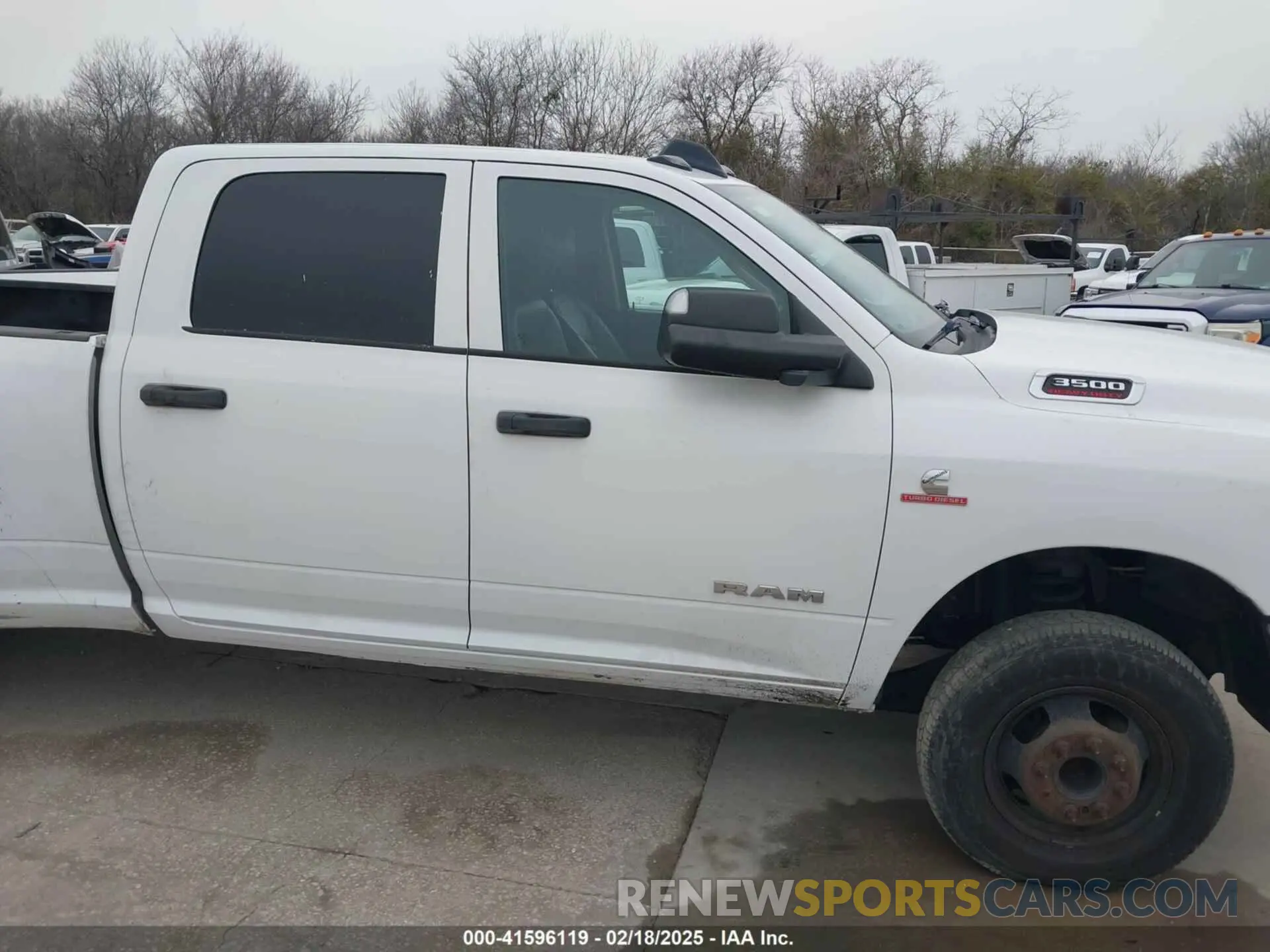 13 Photograph of a damaged car 3C63RRGL3LG292063 RAM 3500 2020