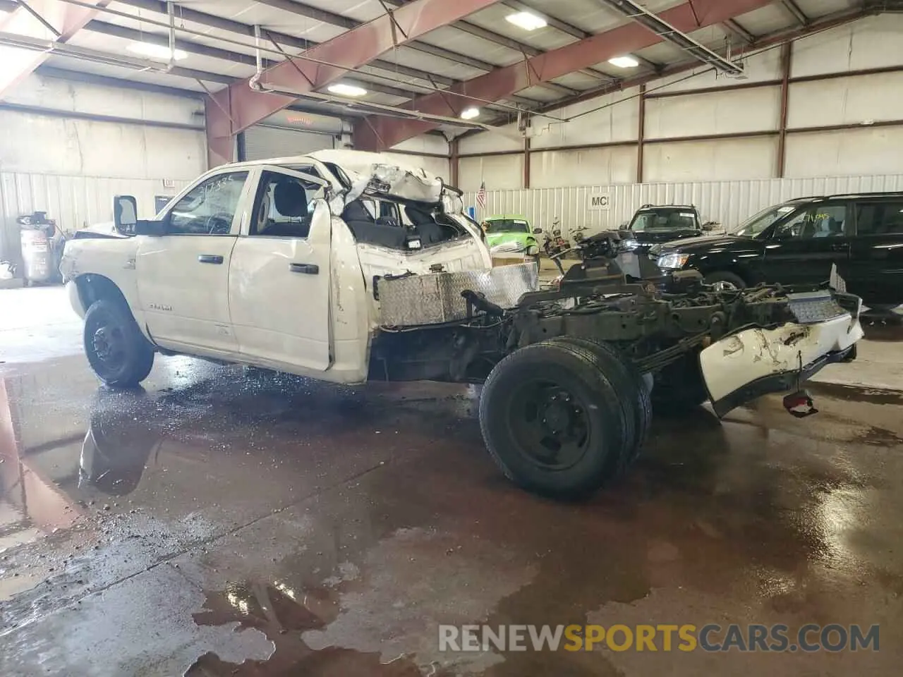 2 Photograph of a damaged car 3C63RRGL5LG108757 RAM 3500 2020