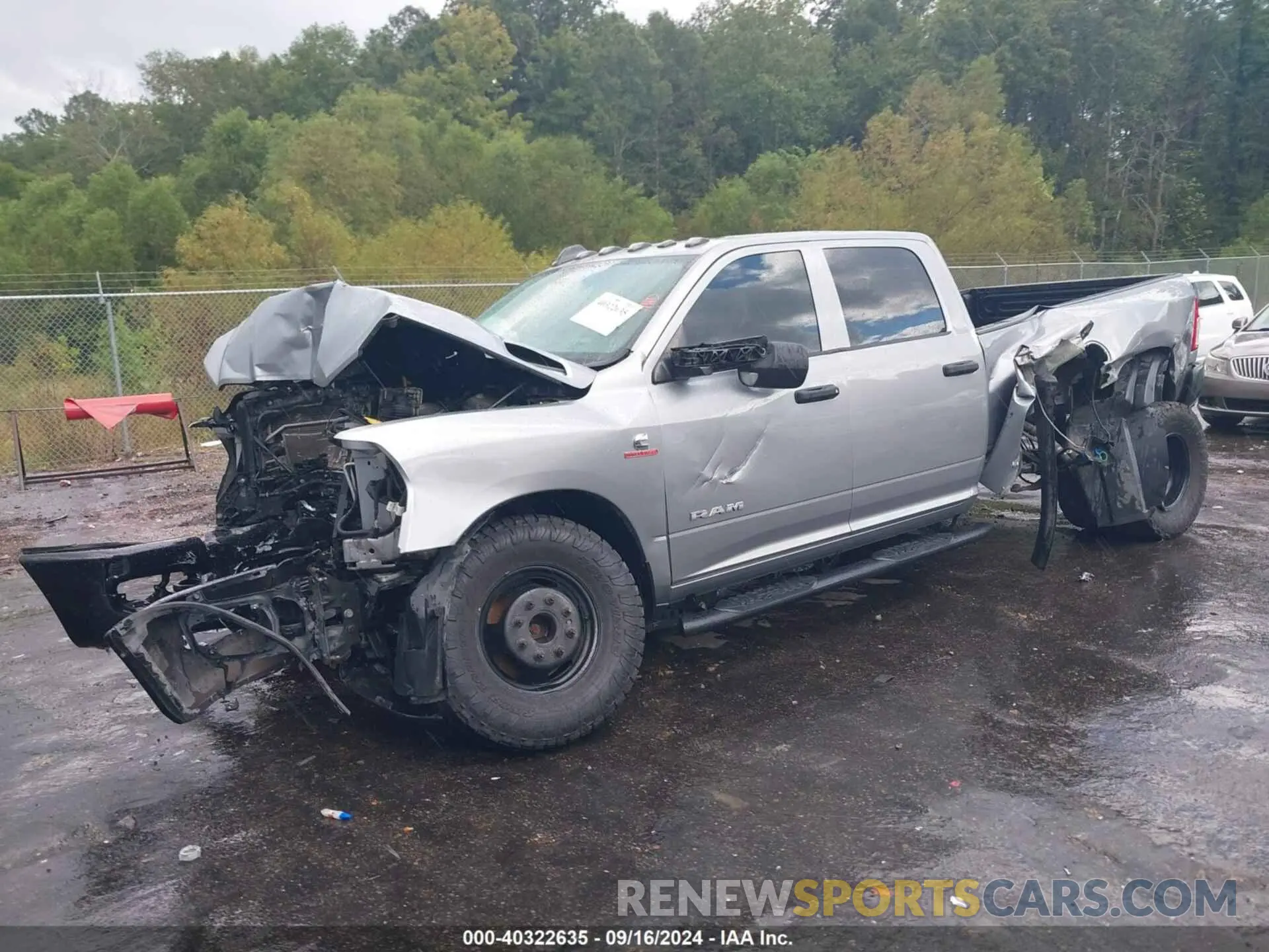 11 Photograph of a damaged car 3C63RRGL8LG153773 RAM 3500 2020