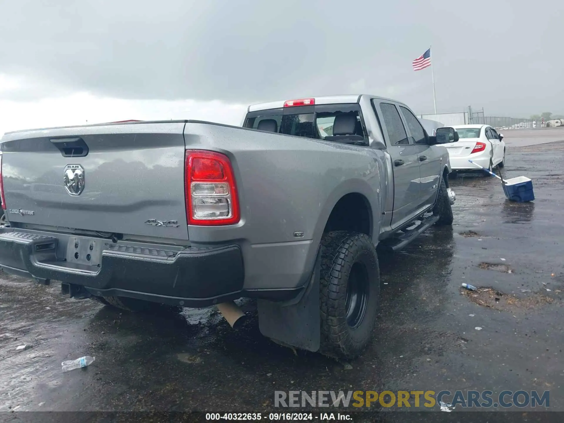 4 Photograph of a damaged car 3C63RRGL8LG153773 RAM 3500 2020