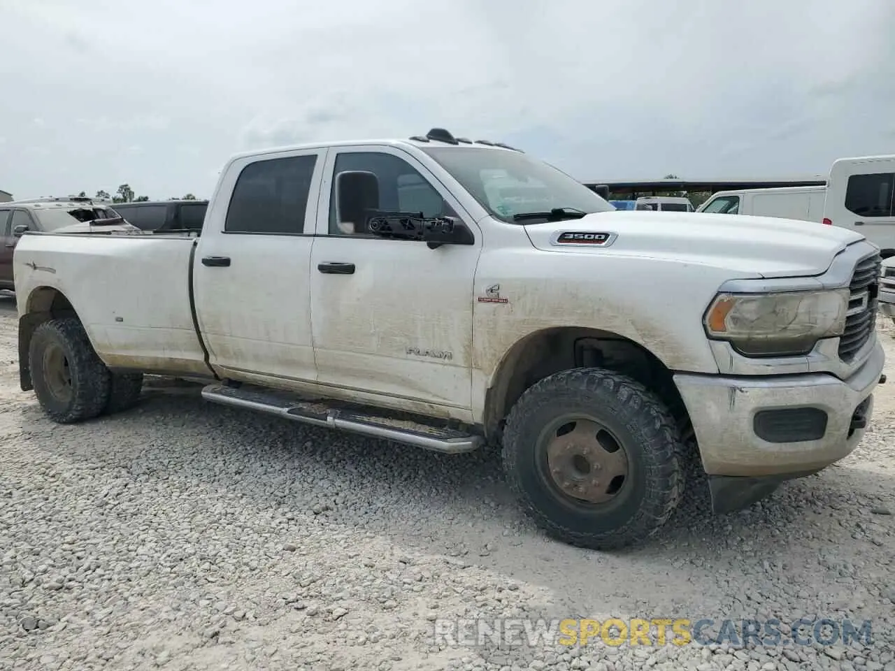4 Photograph of a damaged car 3C63RRGL8LG291930 RAM 3500 2020
