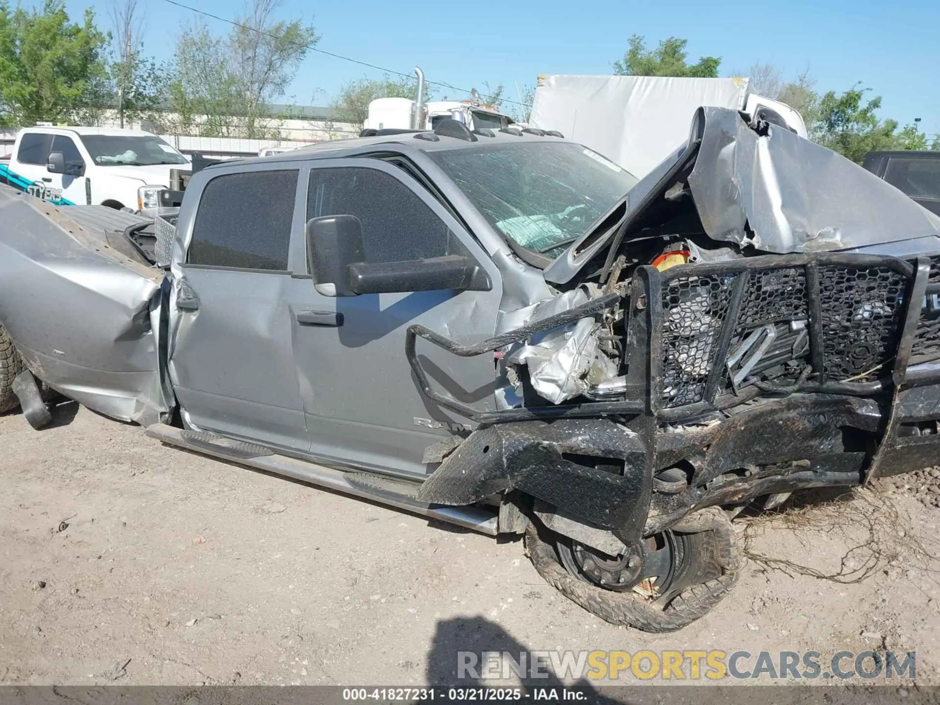 1 Photograph of a damaged car 3C63RRGLXLG114067 RAM 3500 2020