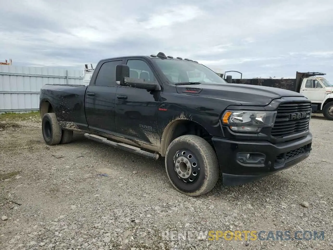 4 Photograph of a damaged car 3C63RRHL2LG261952 RAM 3500 2020