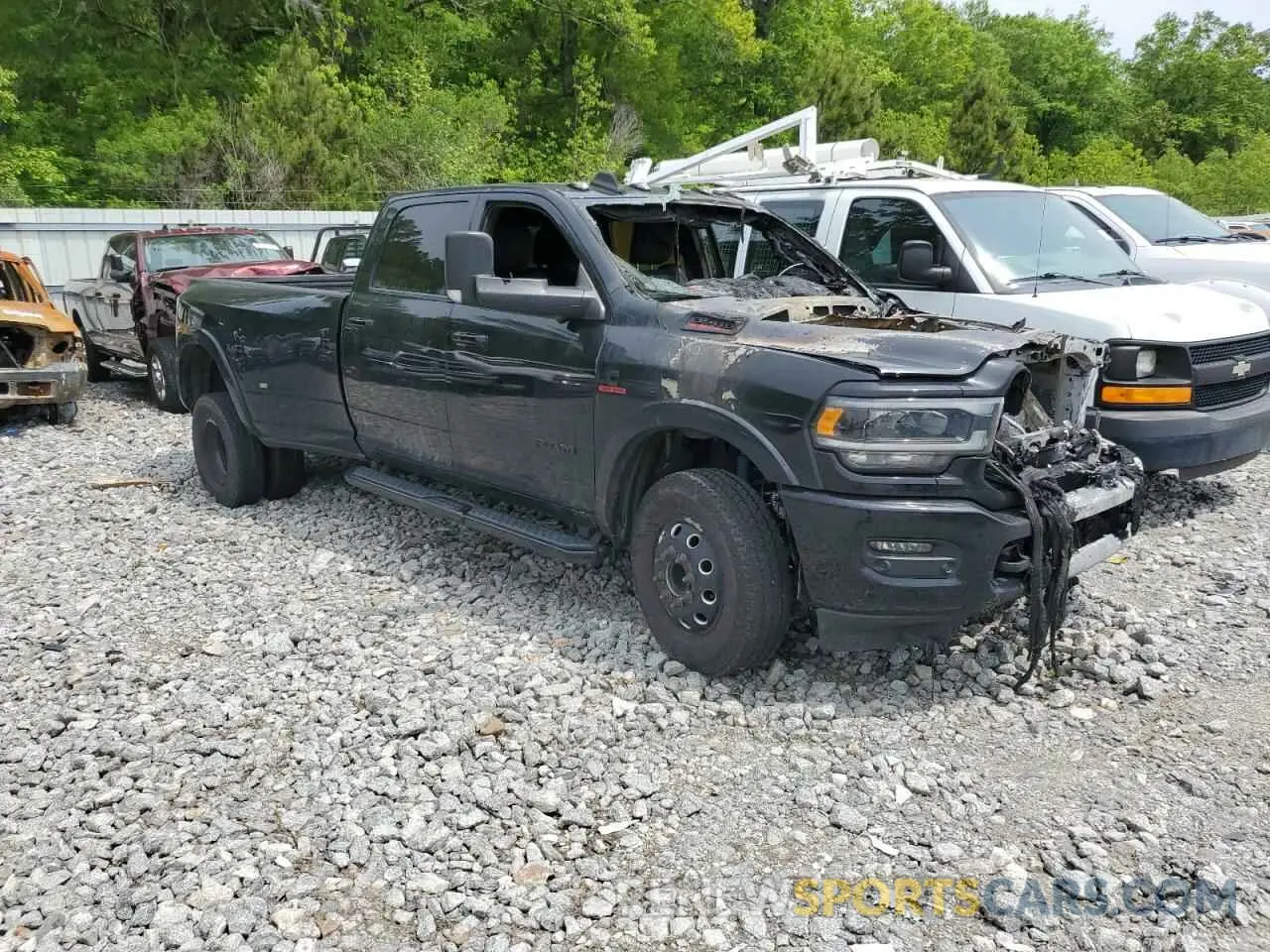 4 Photograph of a damaged car 3C63RRJL9LG176133 RAM 3500 2020