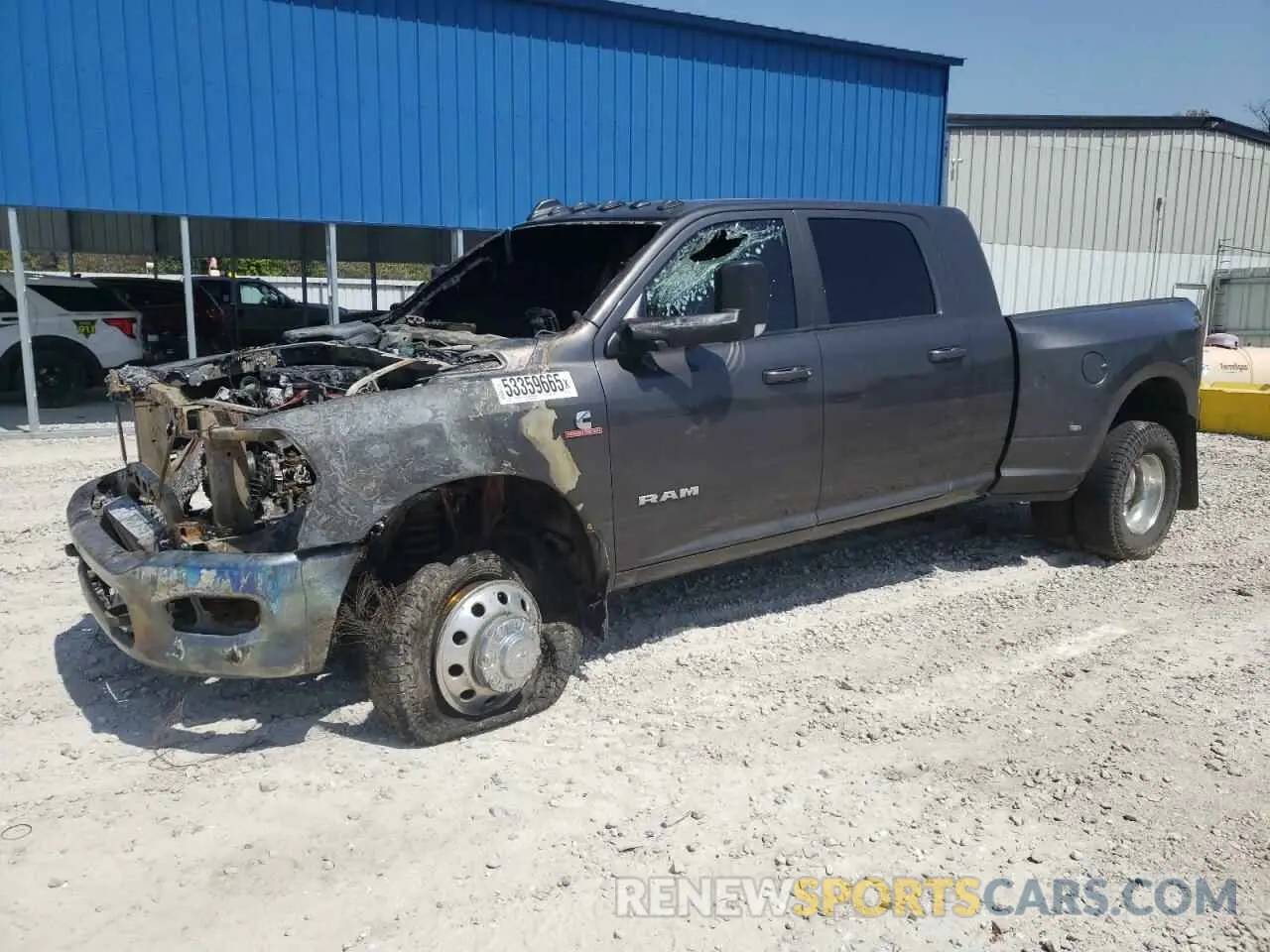 1 Photograph of a damaged car 3C63RRLL2LG120919 RAM 3500 2020