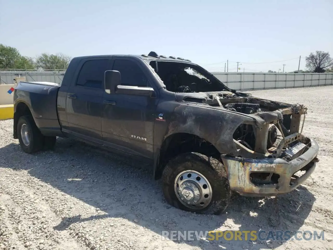 4 Photograph of a damaged car 3C63RRLL2LG120919 RAM 3500 2020