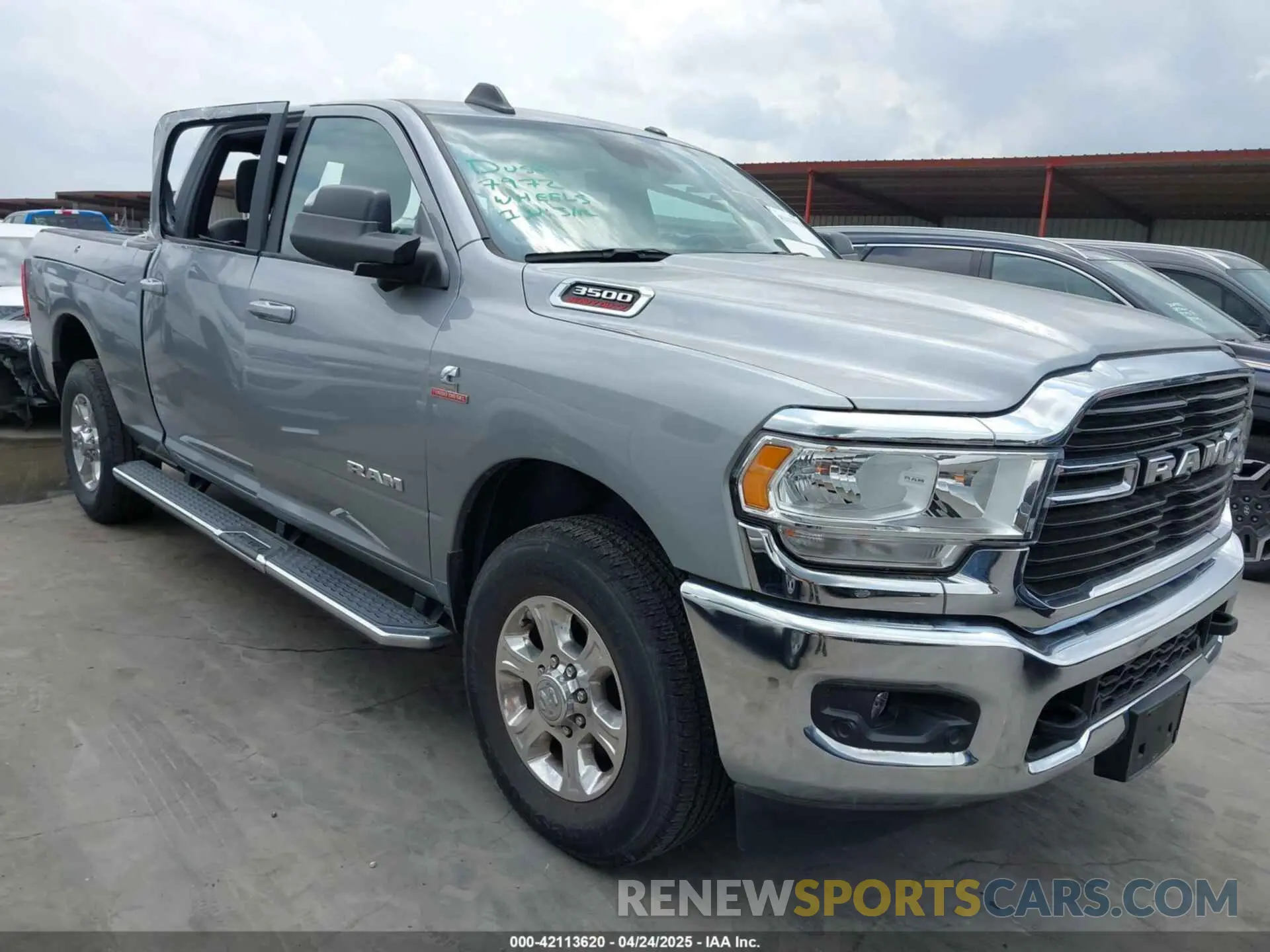 1 Photograph of a damaged car 3C63R2DLXMG602531 RAM 3500 2021
