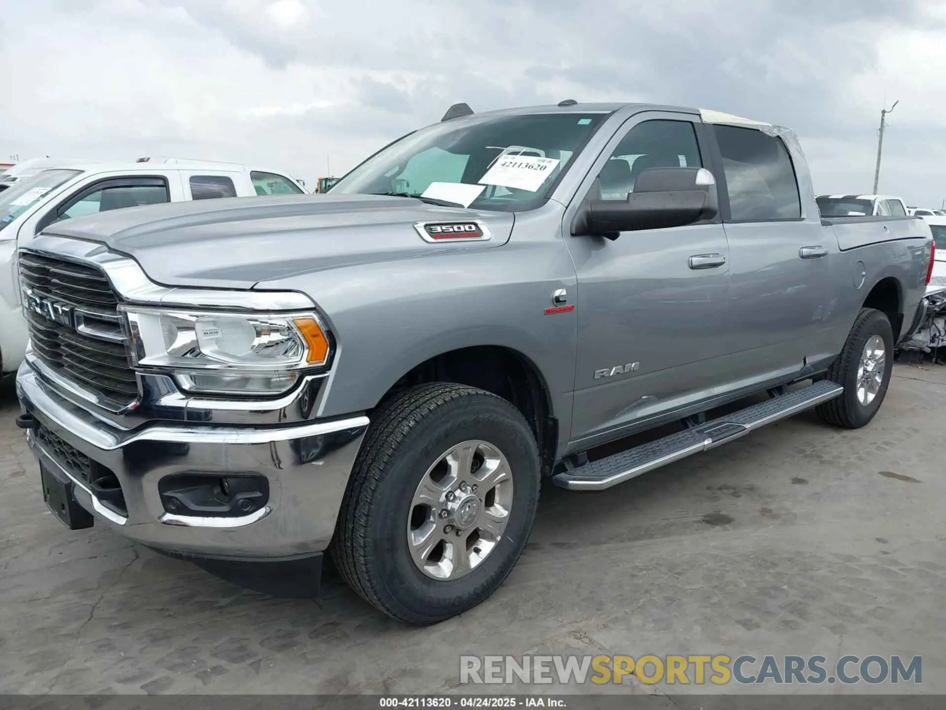 2 Photograph of a damaged car 3C63R2DLXMG602531 RAM 3500 2021