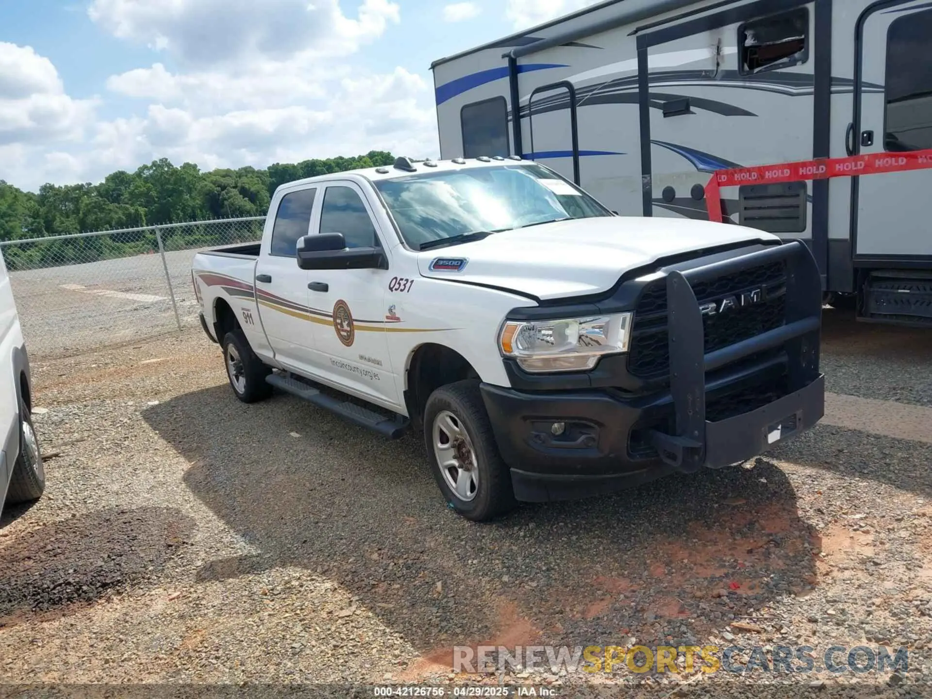 1 Photograph of a damaged car 3C63R3CLXMG692349 RAM 3500 2021