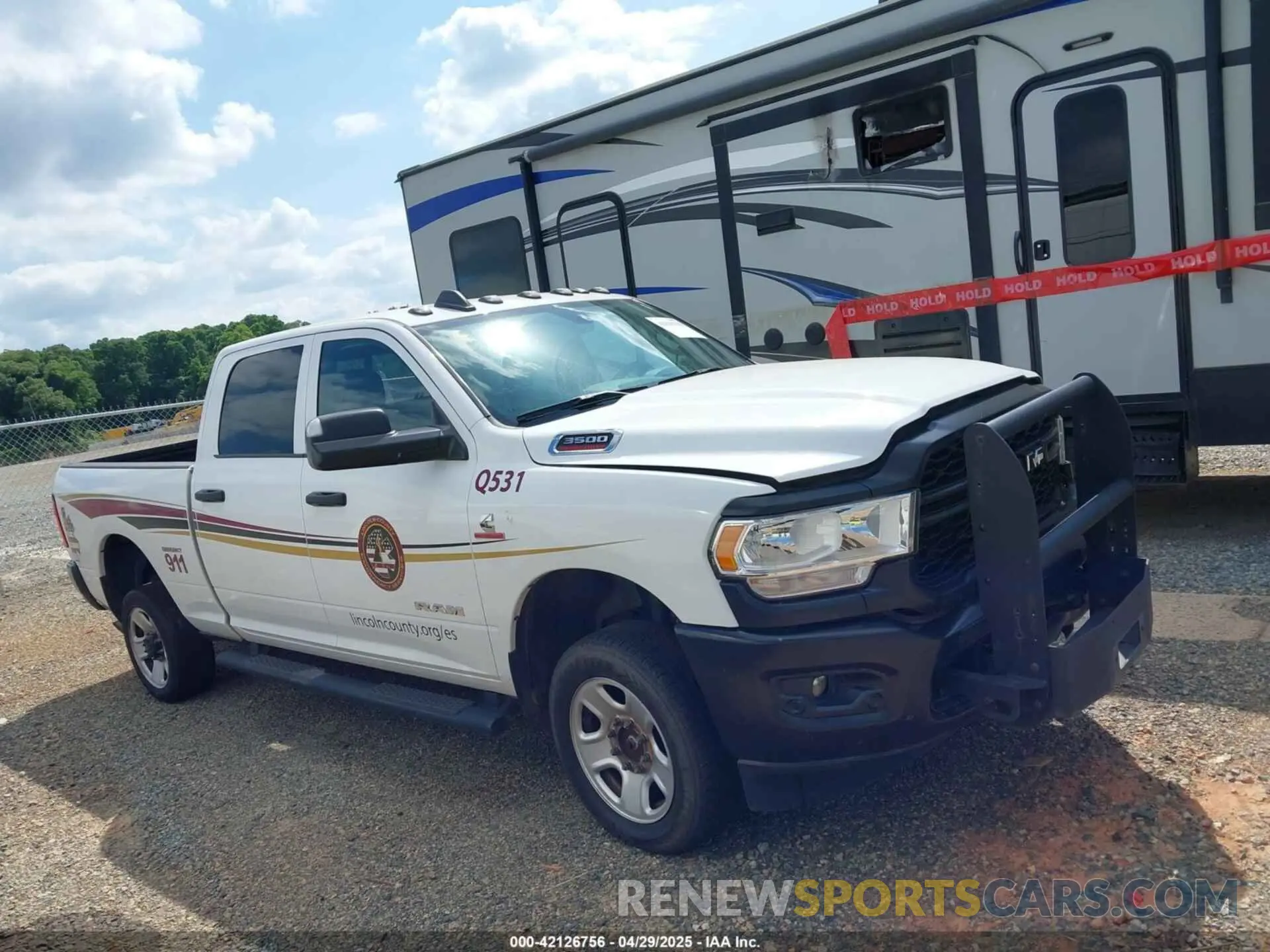 13 Photograph of a damaged car 3C63R3CLXMG692349 RAM 3500 2021