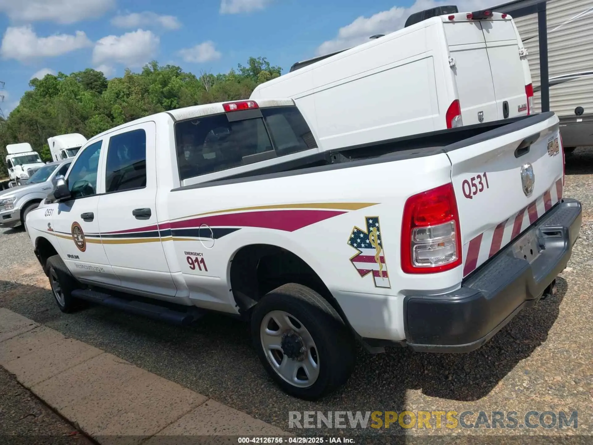 14 Photograph of a damaged car 3C63R3CLXMG692349 RAM 3500 2021