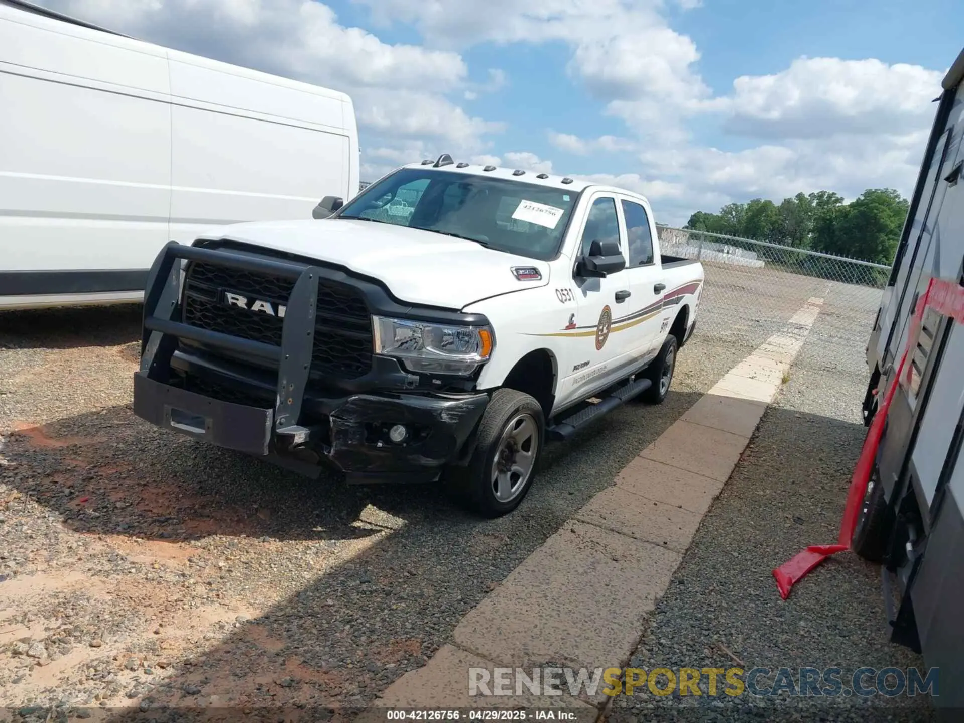 2 Photograph of a damaged car 3C63R3CLXMG692349 RAM 3500 2021