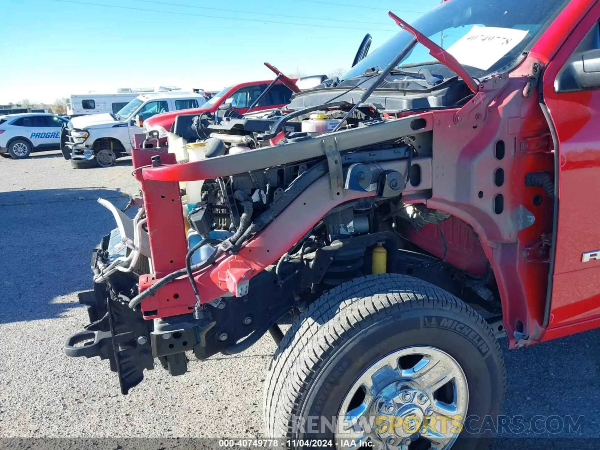13 Photograph of a damaged car 3C63R3GLXMG686965 RAM 3500 2021