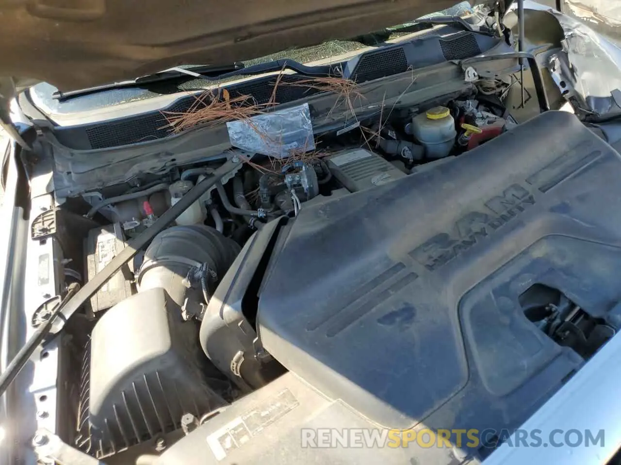 12 Photograph of a damaged car 3C63RPGL4MG592328 RAM 3500 2021